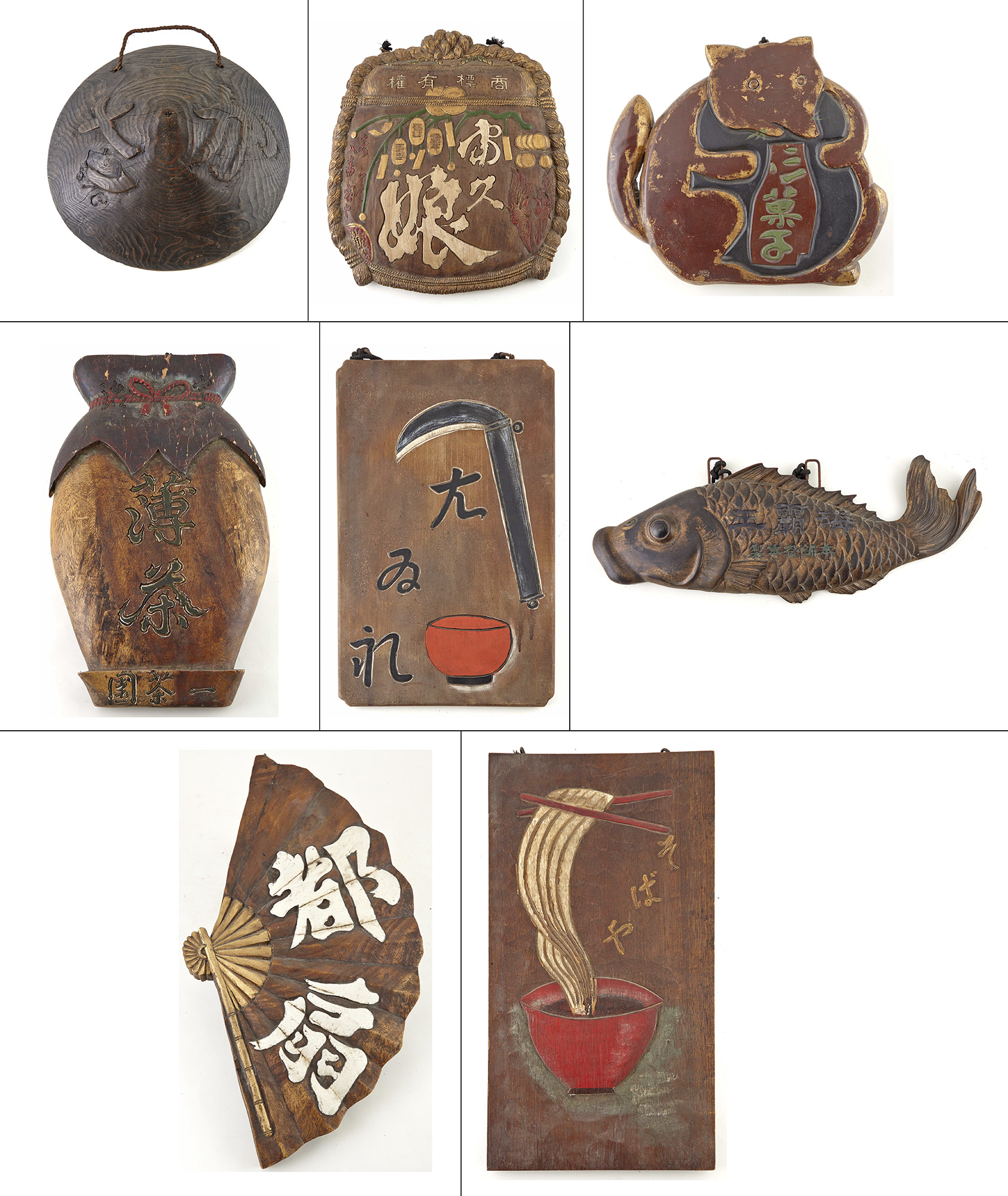 Lot image - Group of Eight Japanese Carved and Painted Shop Signs