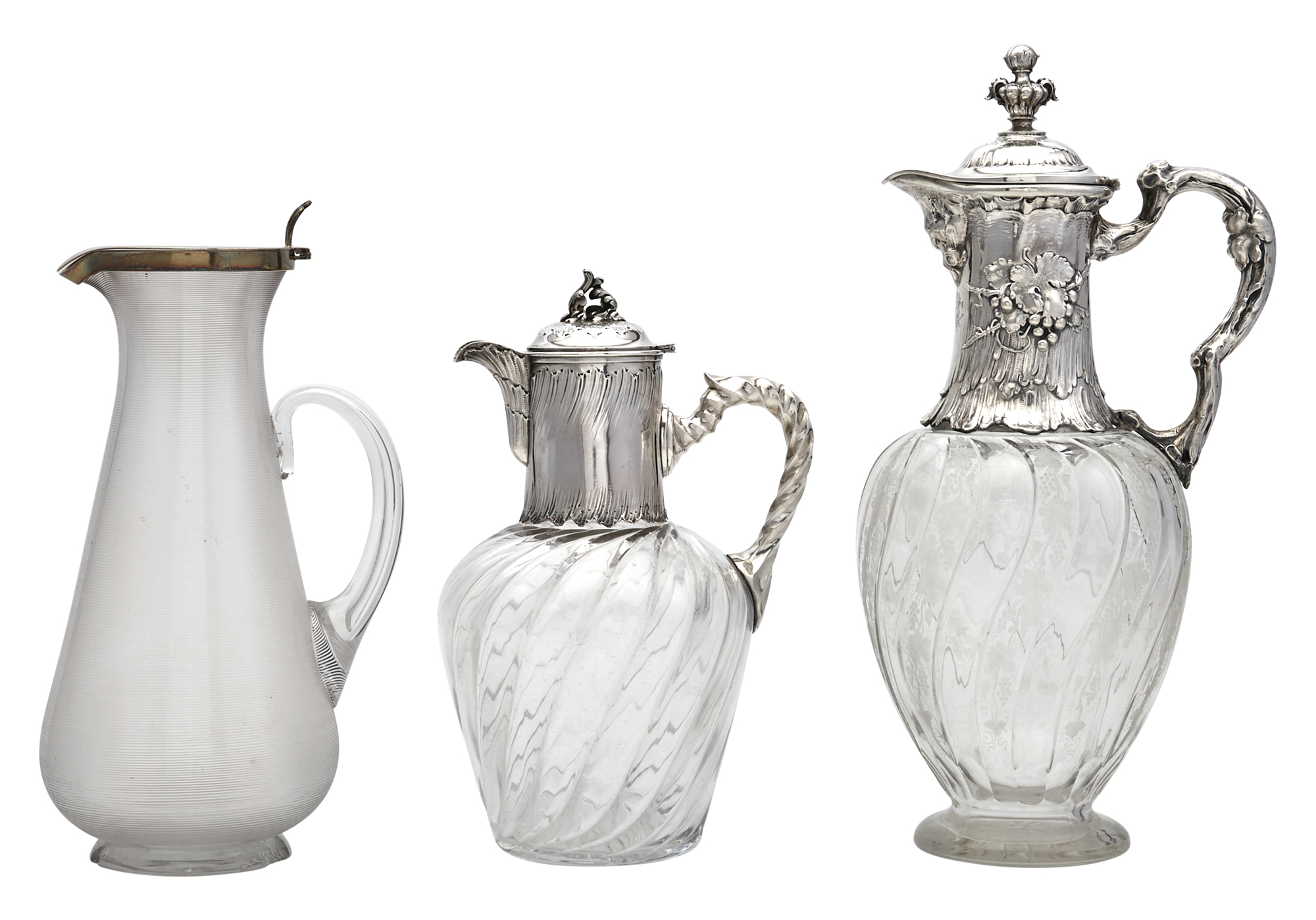 Lot image - Three Silver and Glass Claret Jugs