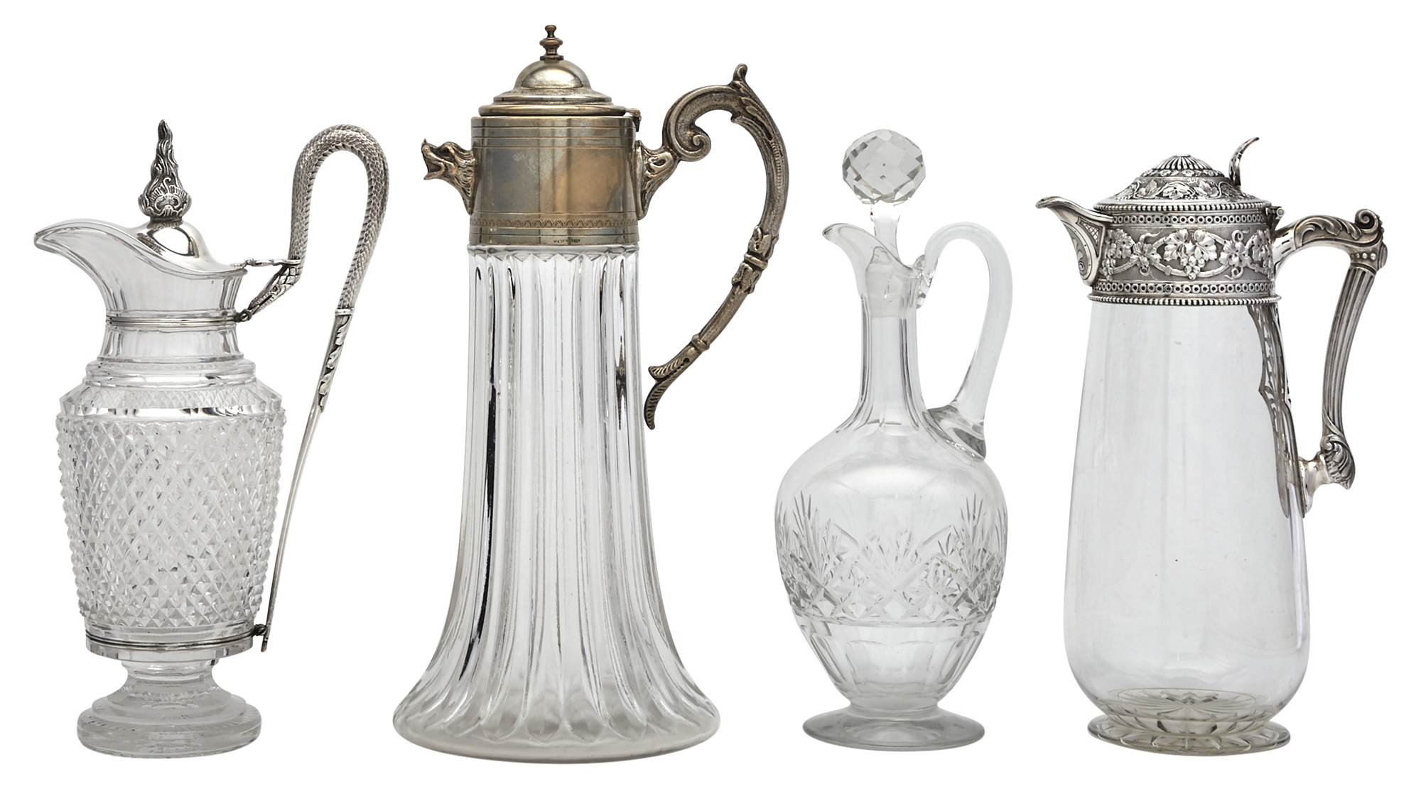 Lot image - Two Victorian Sterling Silver Mounted Glass Claret Jugs