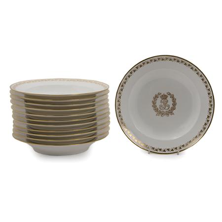 Lot image - Set of Twelve Sevres Gilt Decorated Porcelain Rim Soup Bowls