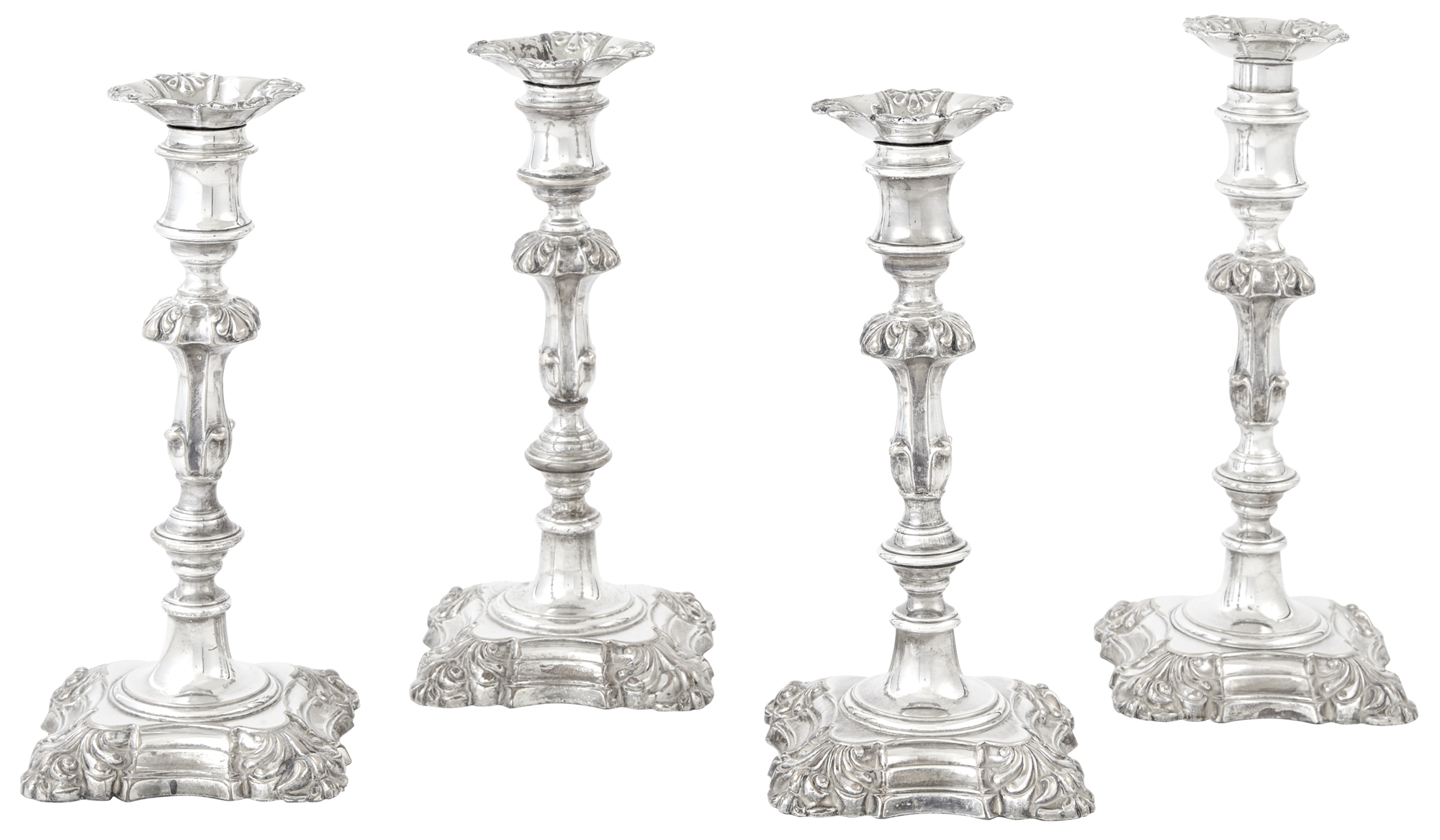 Lot image - Set of Four George III Style Silver Plated Candlesticks