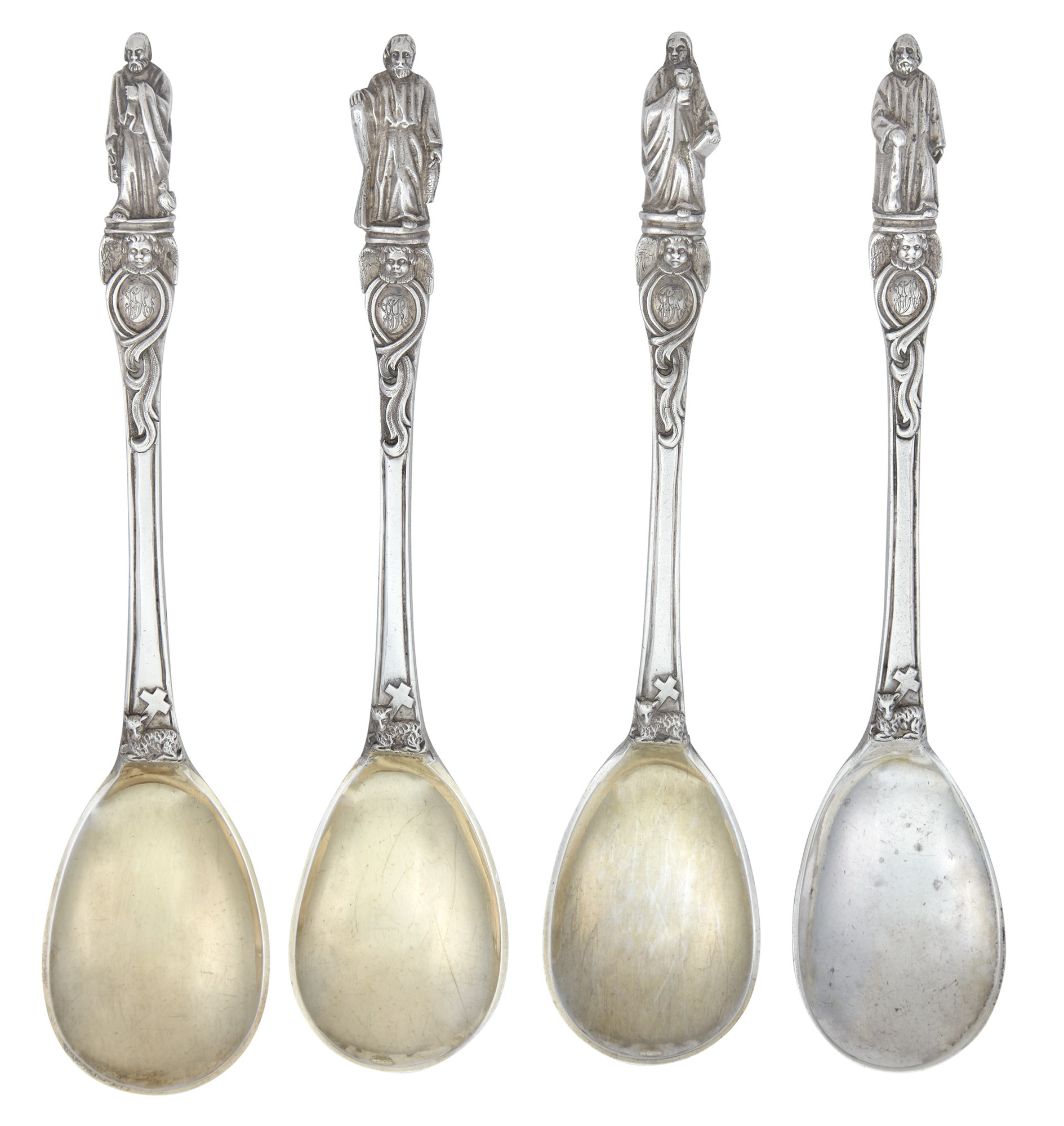 Lot image - Set of Four Victorian Sterling Silver Apostle Serving Spoons