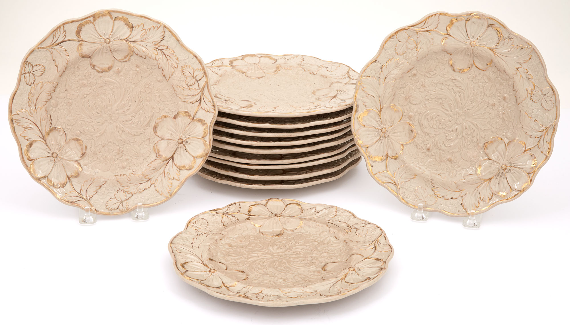 Lot image - Set of Twelve English Gilt, Glazed and Floral Molded Earthenware Salad/Dessert  Plates