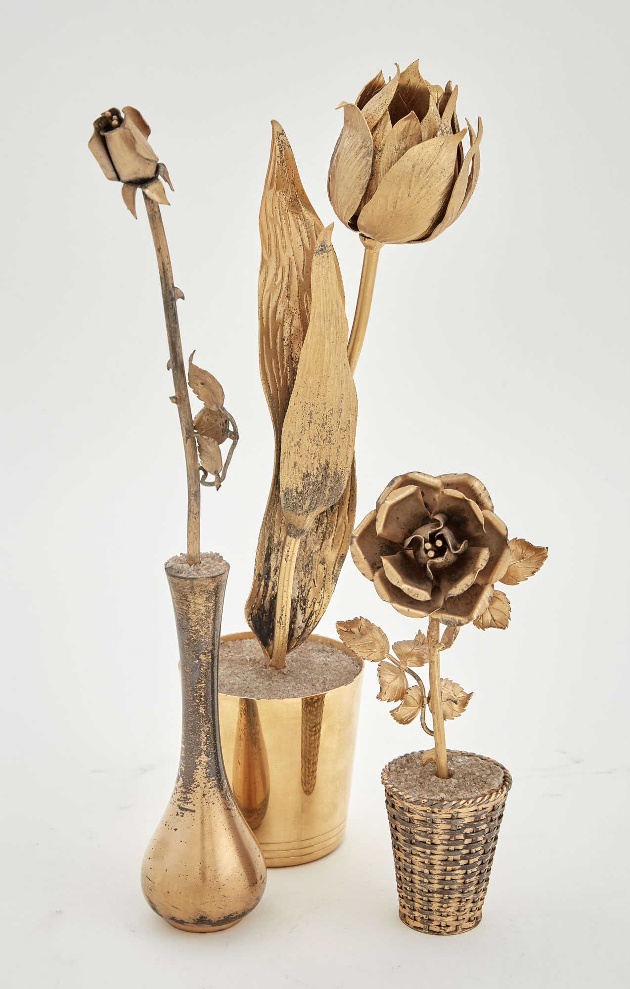 Lot image - Three Tiffany & Co. Sterling Silver-Gilt Flowers