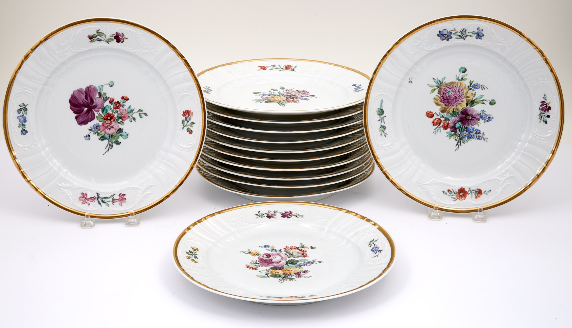 Lot image - Set of Thirteen Royal Copenhagen Gilt and Floral Decorated Porcelain Dinner Plates