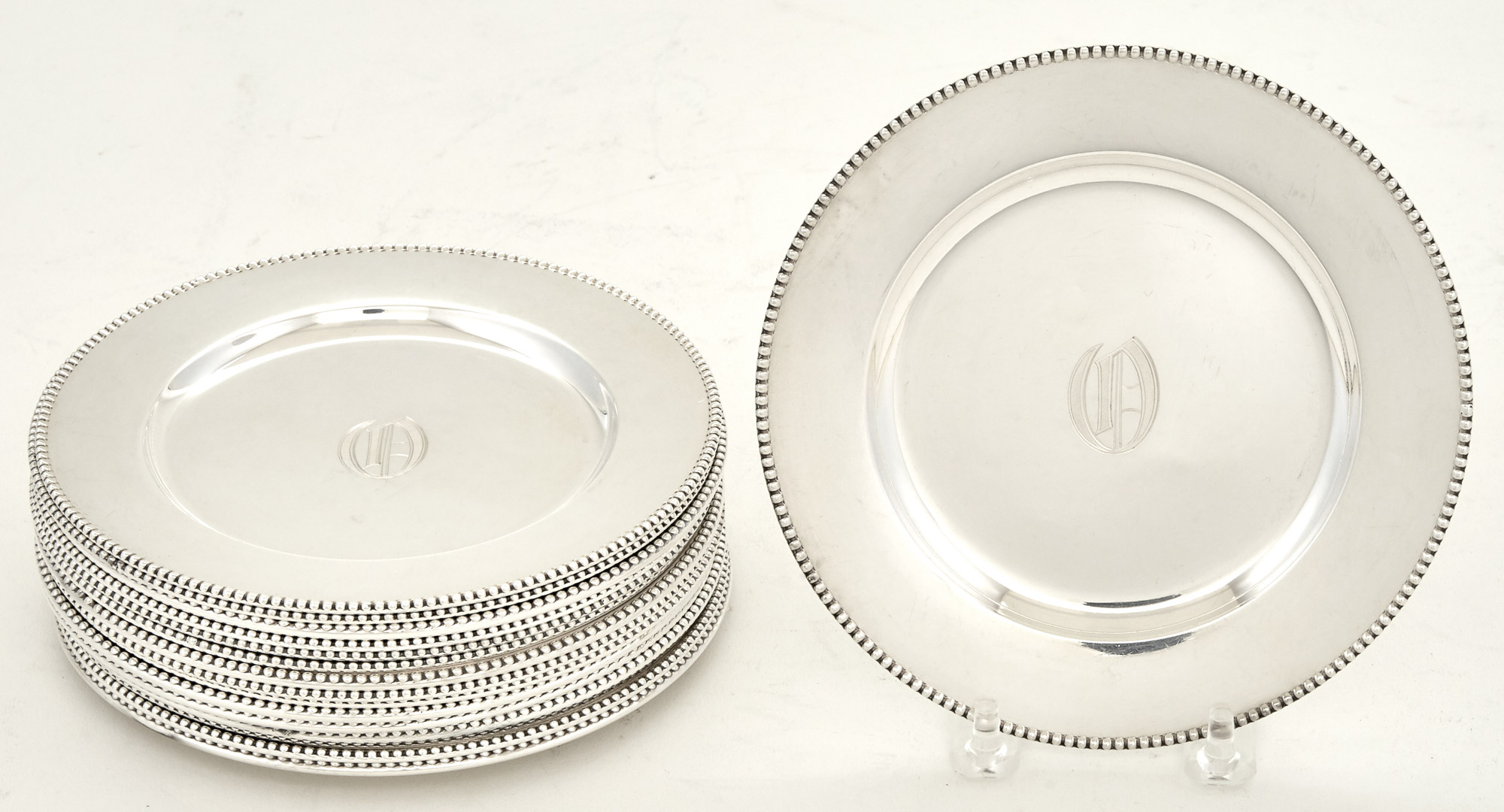 Lot image - Set of Sixteen American Sterling Silver Bread Plates