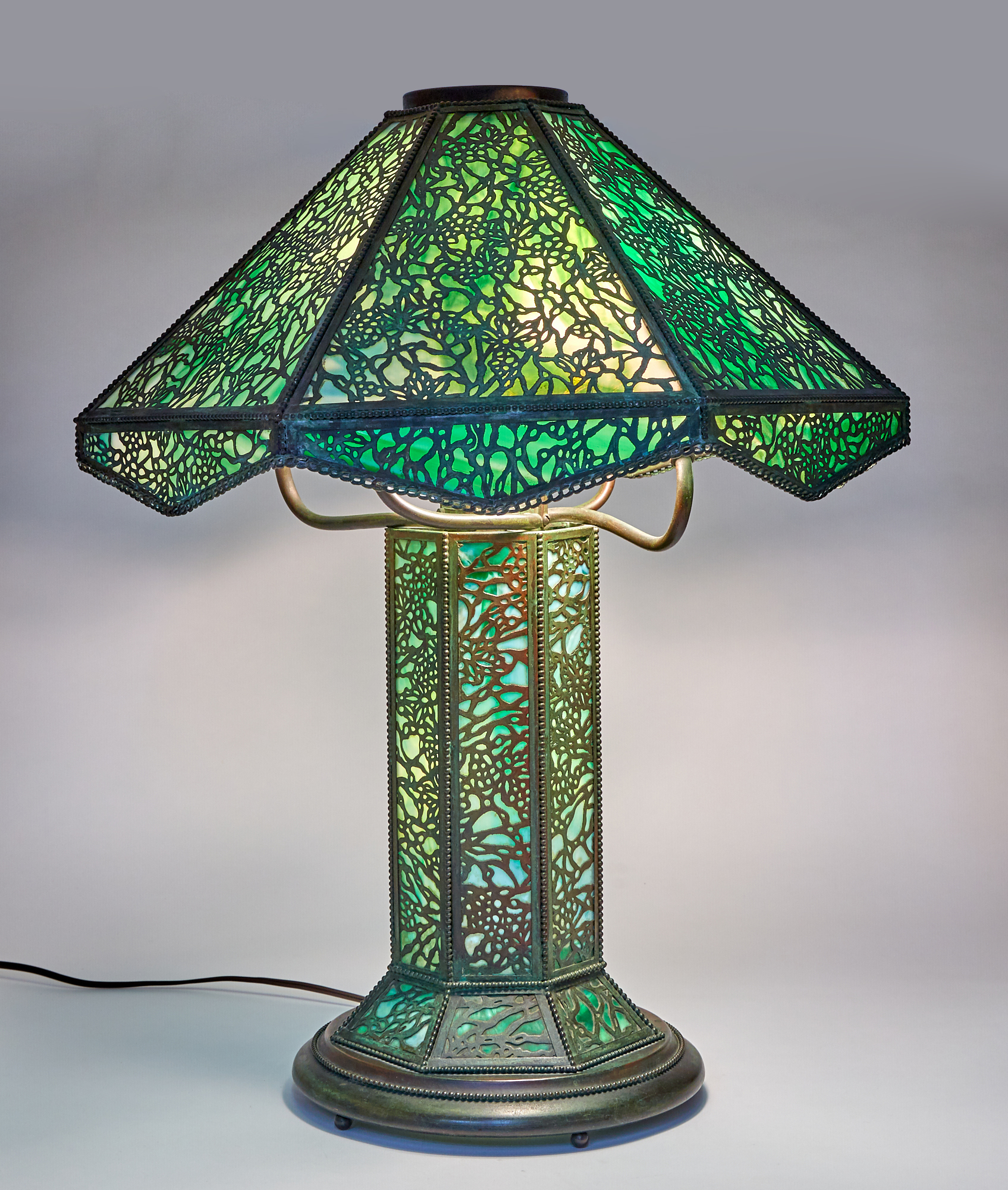 Lot image - Riviere Brass and Bronze Works Arts and Crafts Etched Metal and Slag Glass Table Lamp