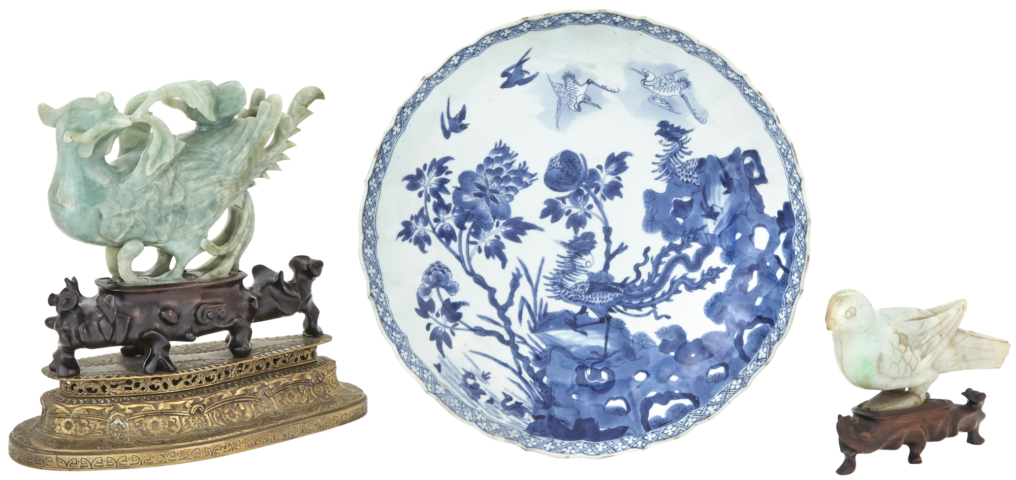 Lot image - Two Chinese Celadon Jade Bird Carvings with a Blue and White Porcelain Dish