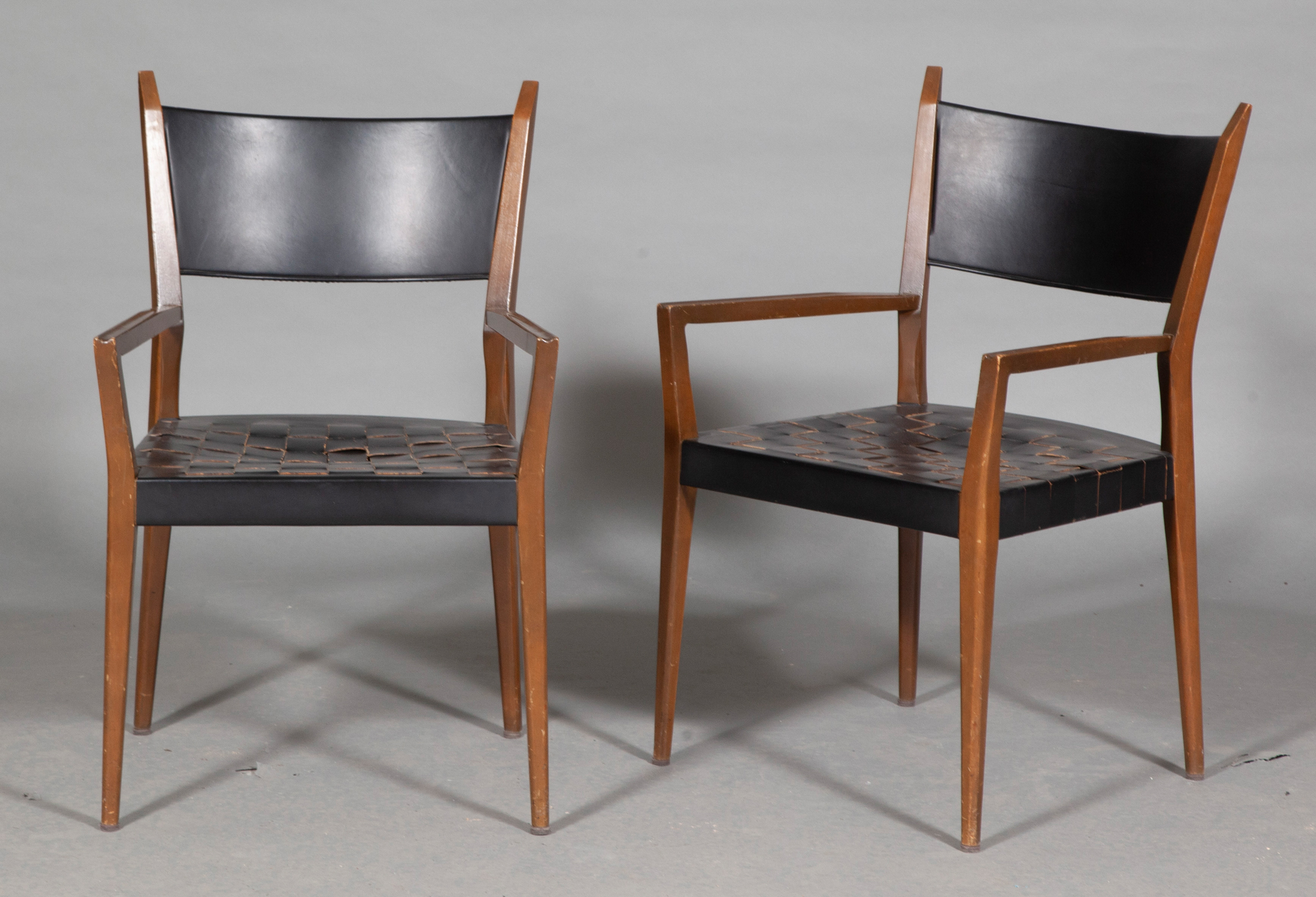 Lot image - Pair of Paul McCobb Walnut and Leather Armchairs