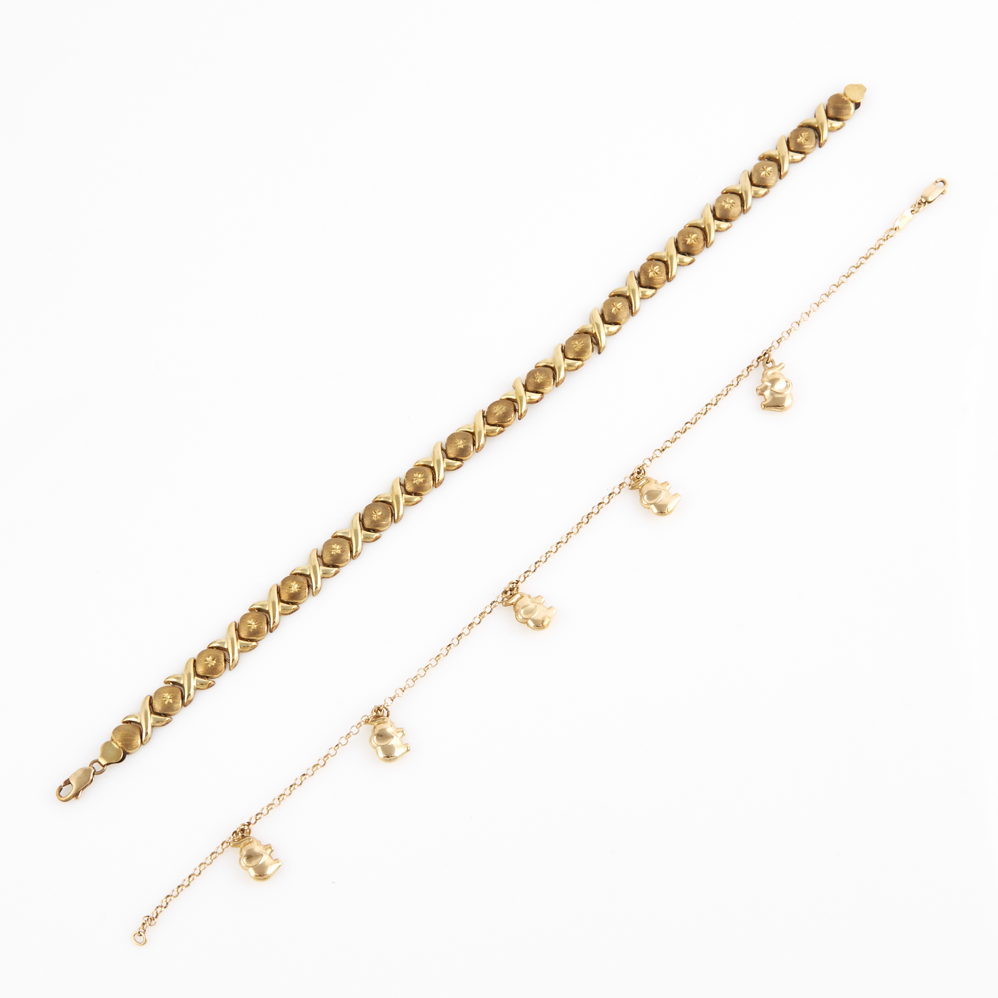 Lot image - Two Gold Anklets with 5 charms attached, 10K 7 dwt.