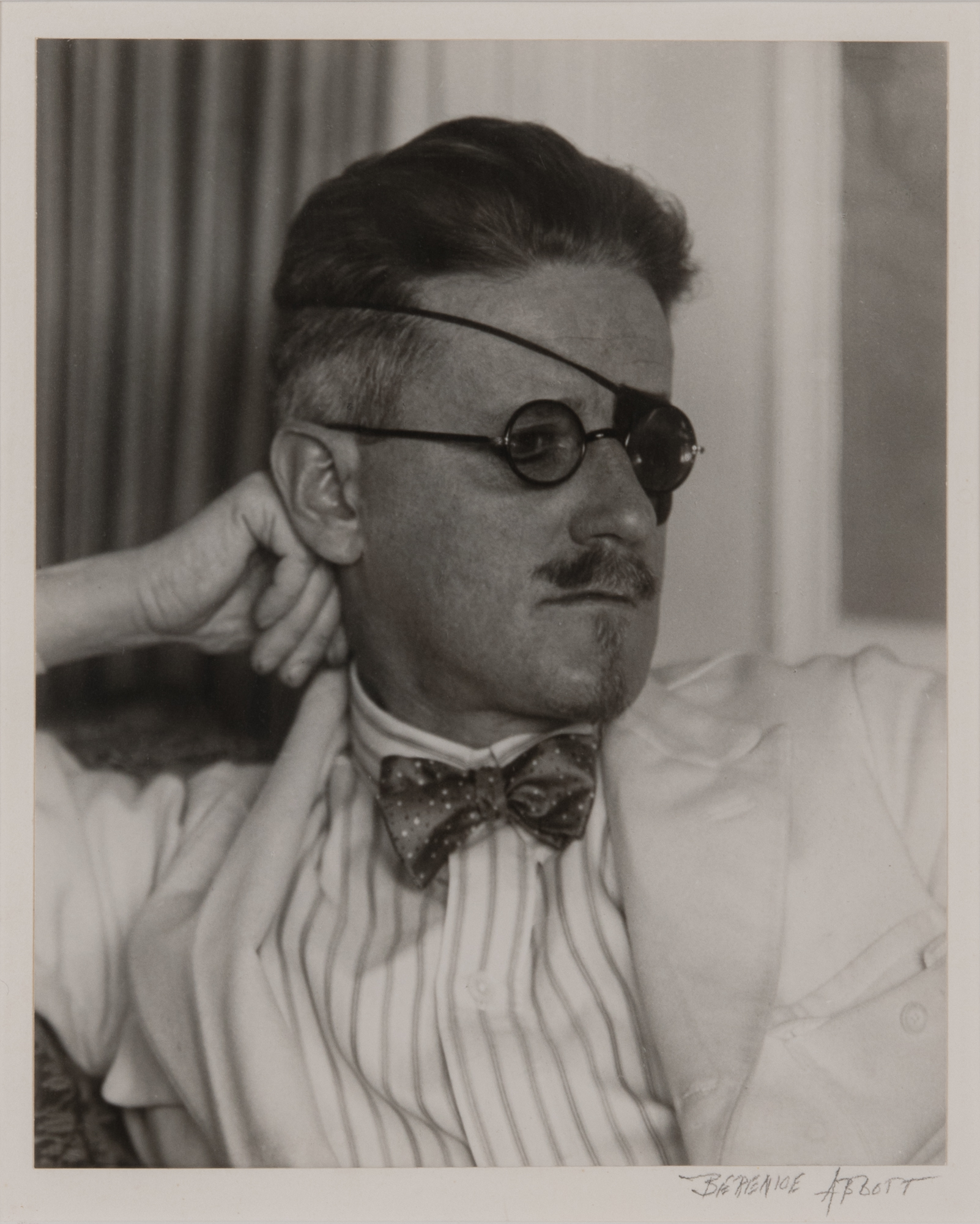 Lot image - ABBOTT, BERENICE (1898-1991)  James Joyce with eyepatch,