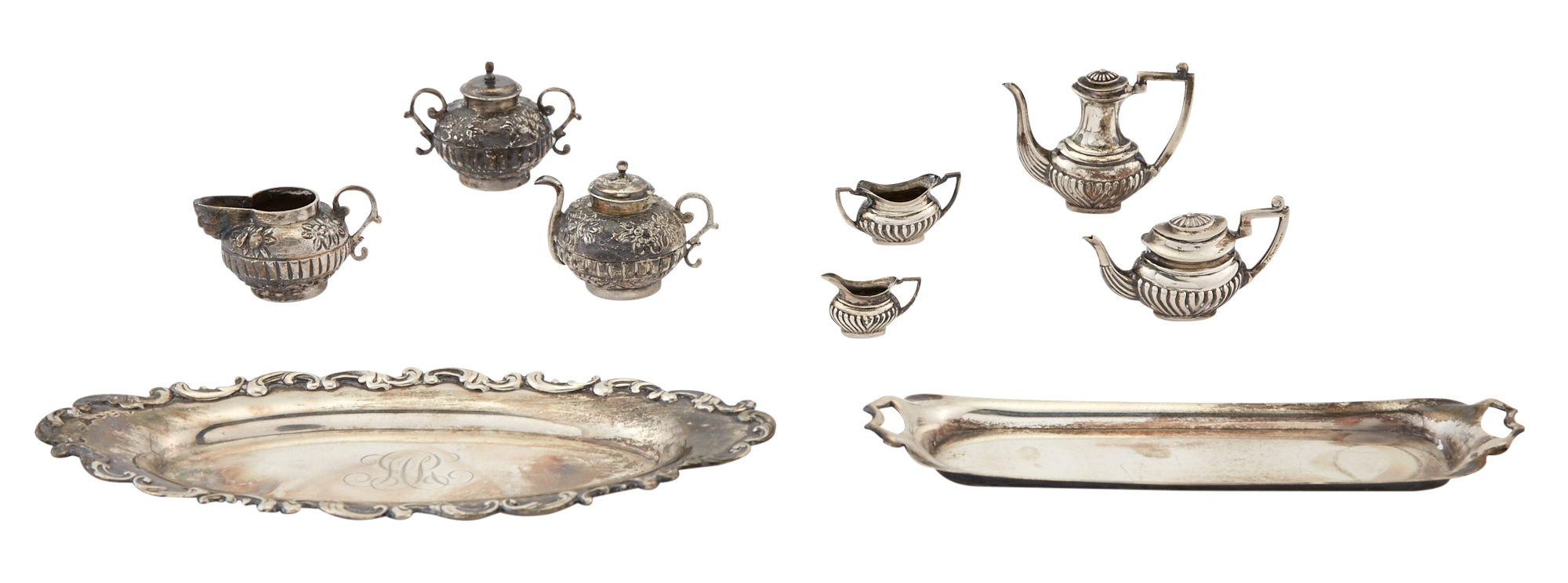 Lot image - Two Miniature Silver Part Tea Services