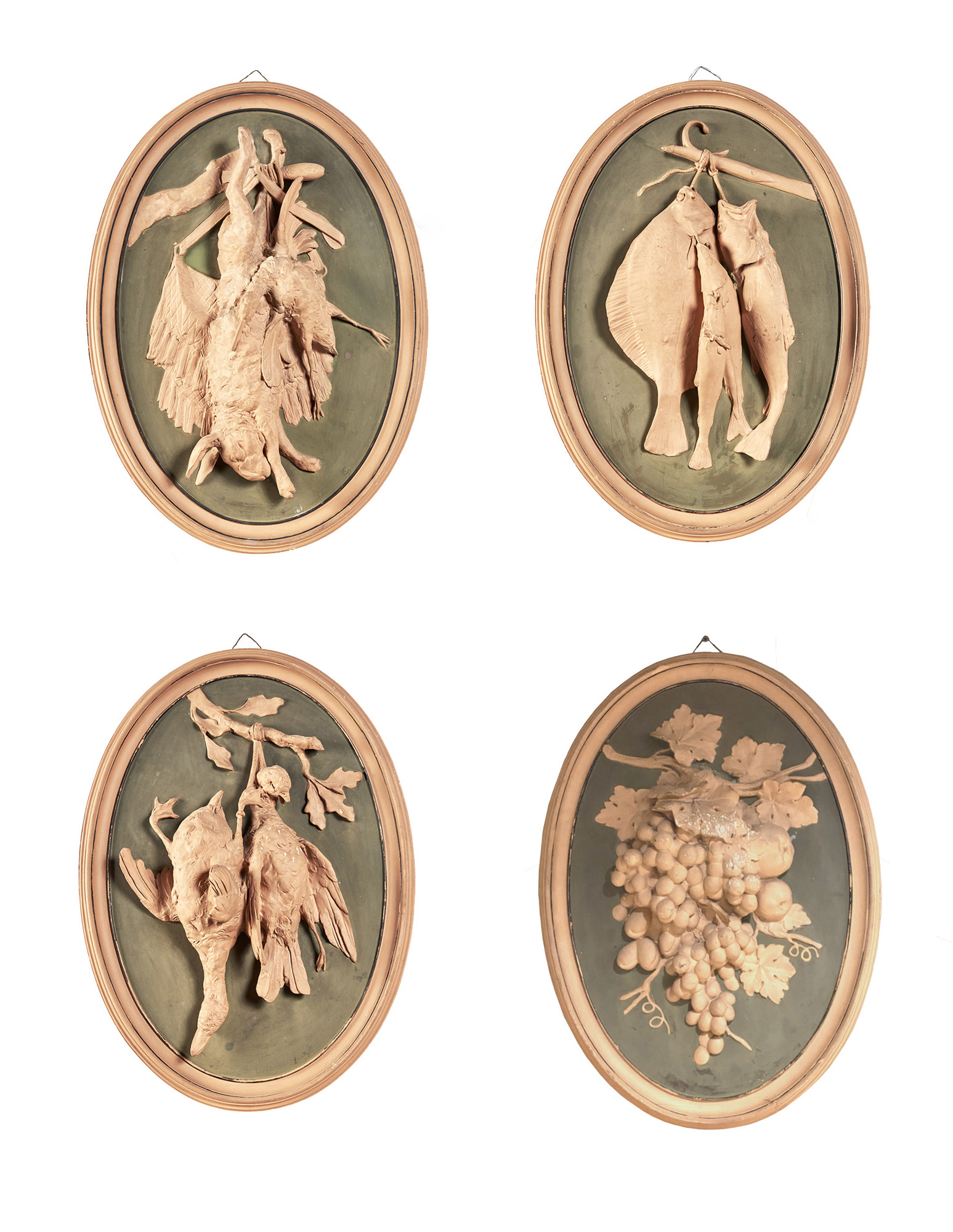 Lot image - Set of Four Danish Painted Terracotta Hunting and Fishing Trophy Plaques