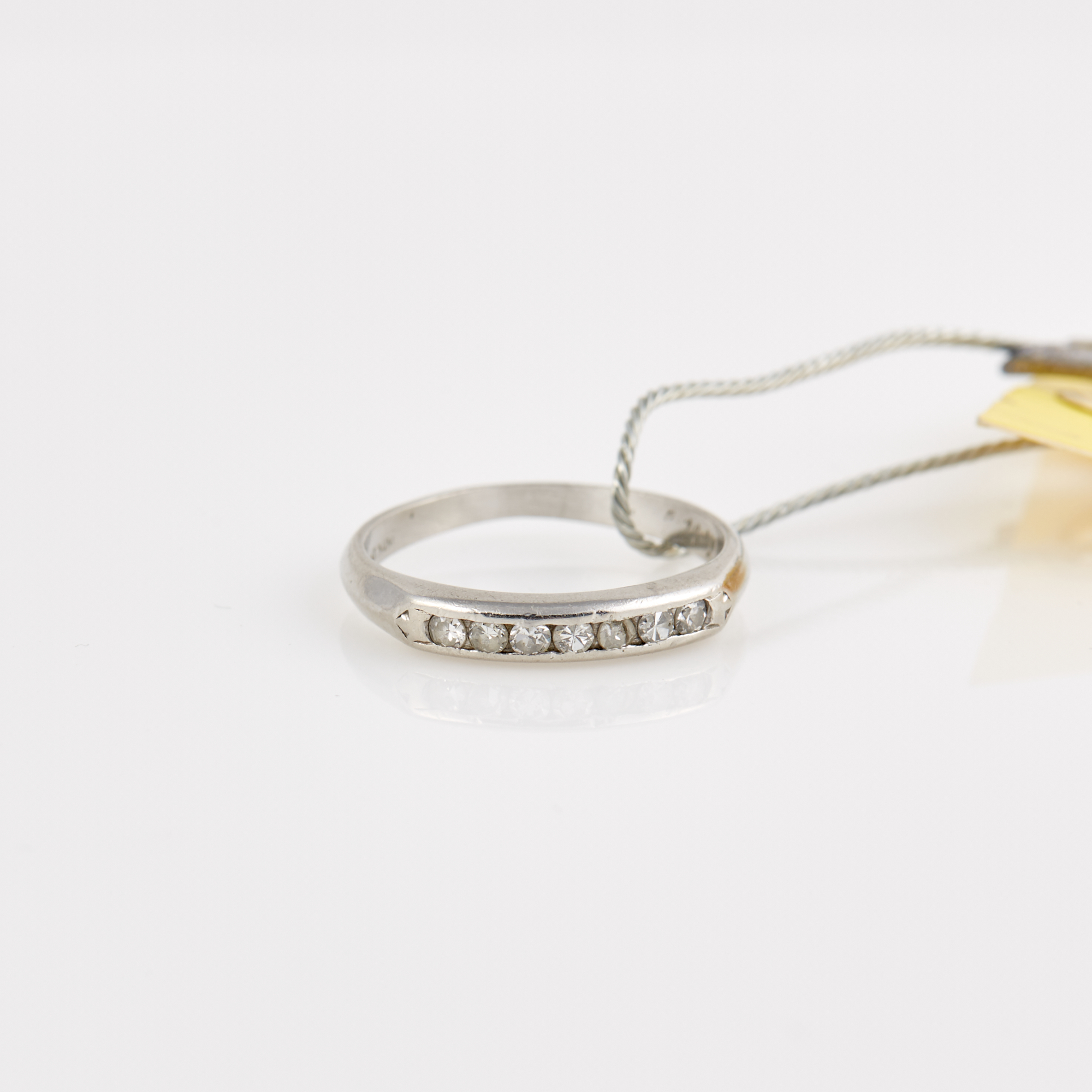 Lot image - Diamond Wedding Ring, Platinum 1 dwt., stones damaged