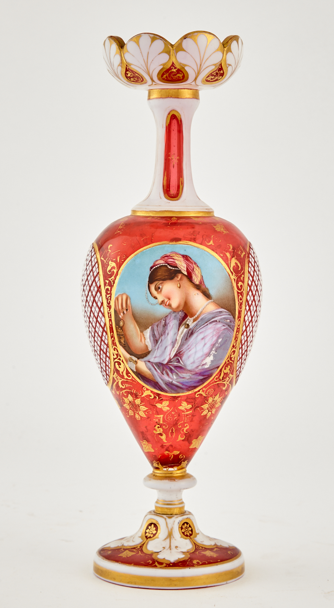 Lot image - Bohemian Style Gilt Decorated Red and White Overlay Glass Portrait Vase