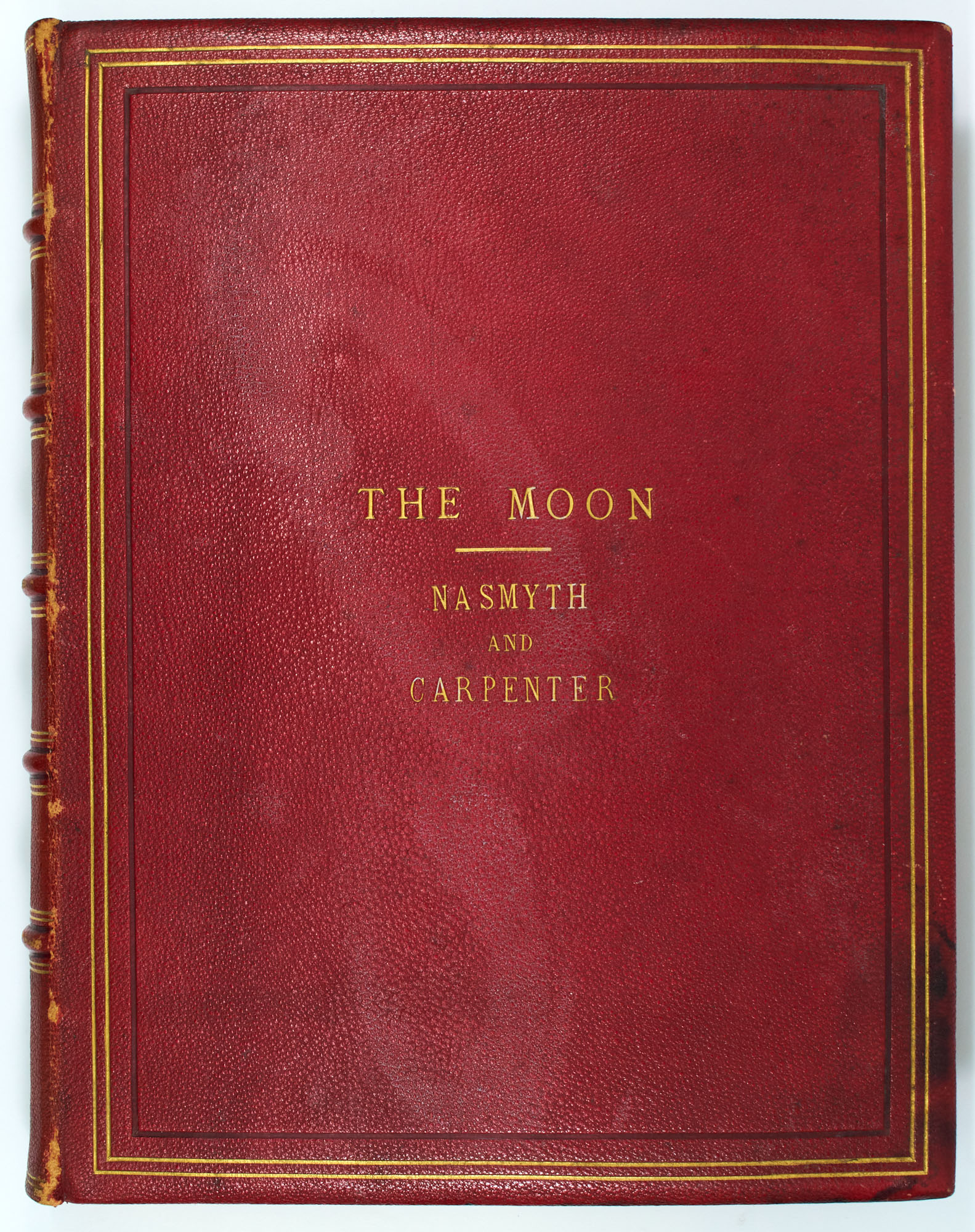 Lot image - [PHOTOBOOK]  NASMYTH, JAMES HALL and CARPENTER, JAMES. The Moon: Considered as a Planet, a World, and a Satellite...