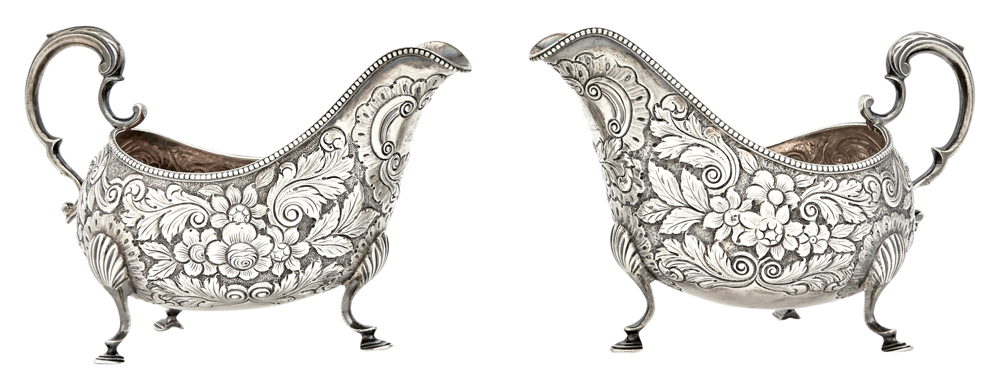 Lot image - Pair of George III Irish Sterling Silver Sauceboats