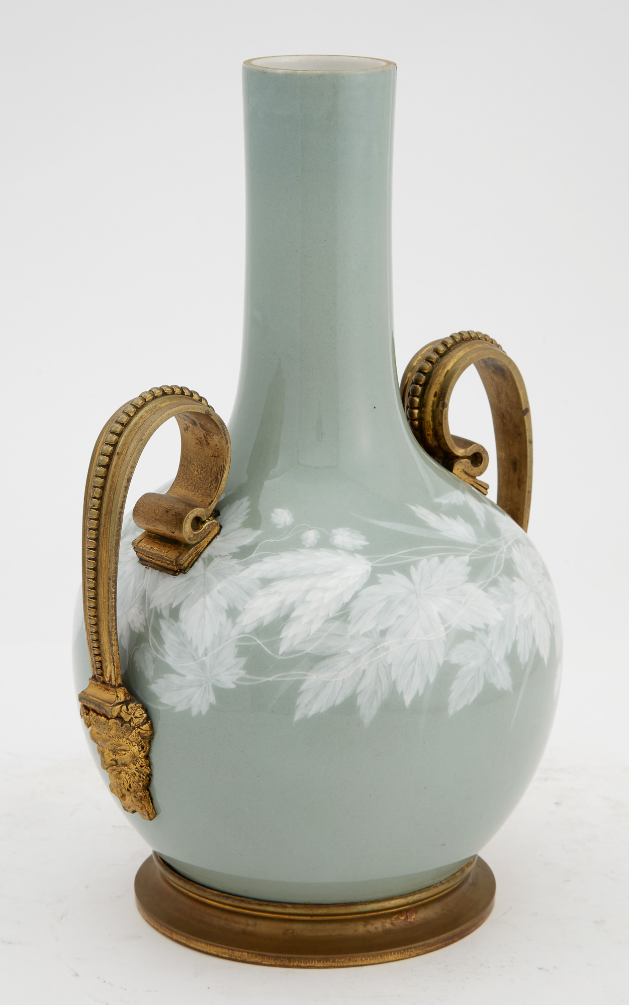 Lot image - French Gilt-Bronze Mounted Pâte-Sur-Pâte Sage Green Ground Porcelain Two-Handled Vase