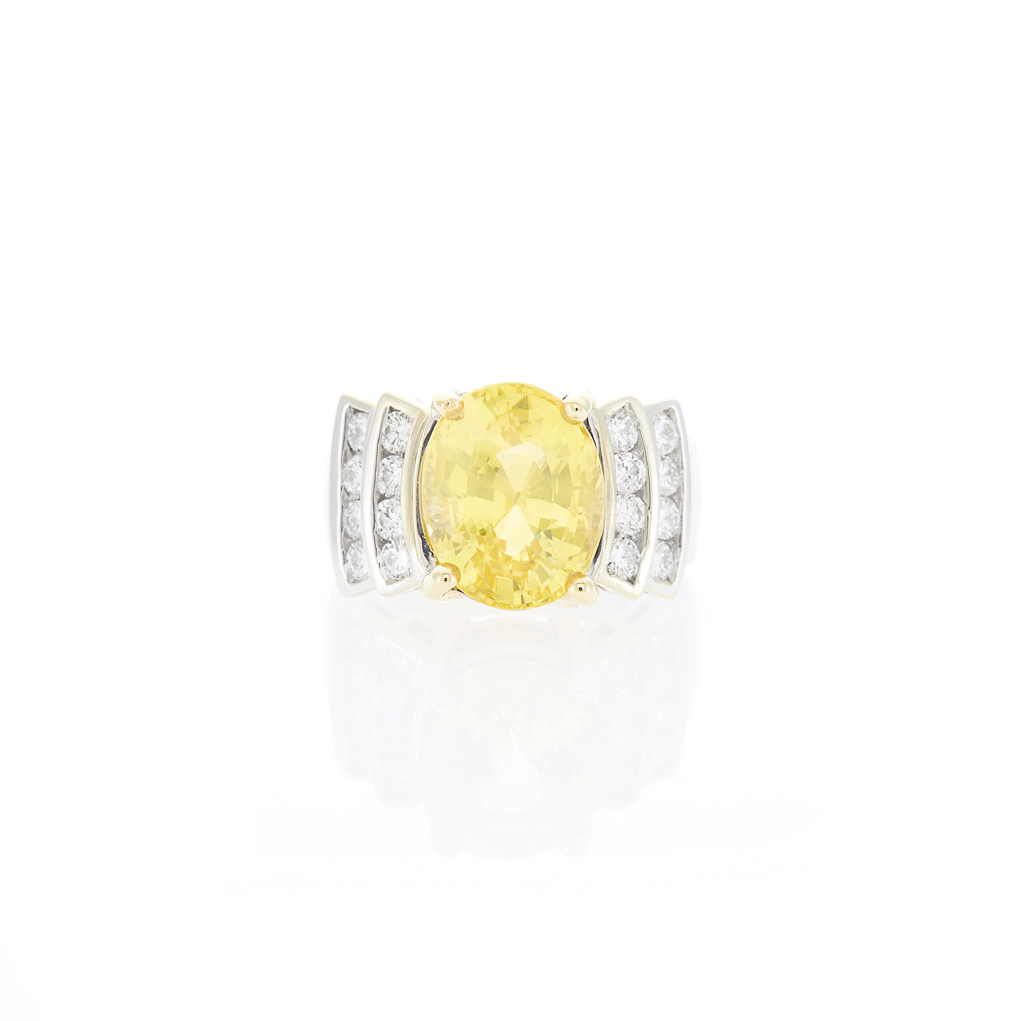 Lot image - White Gold, Yellow Sapphire and Diamond Ring