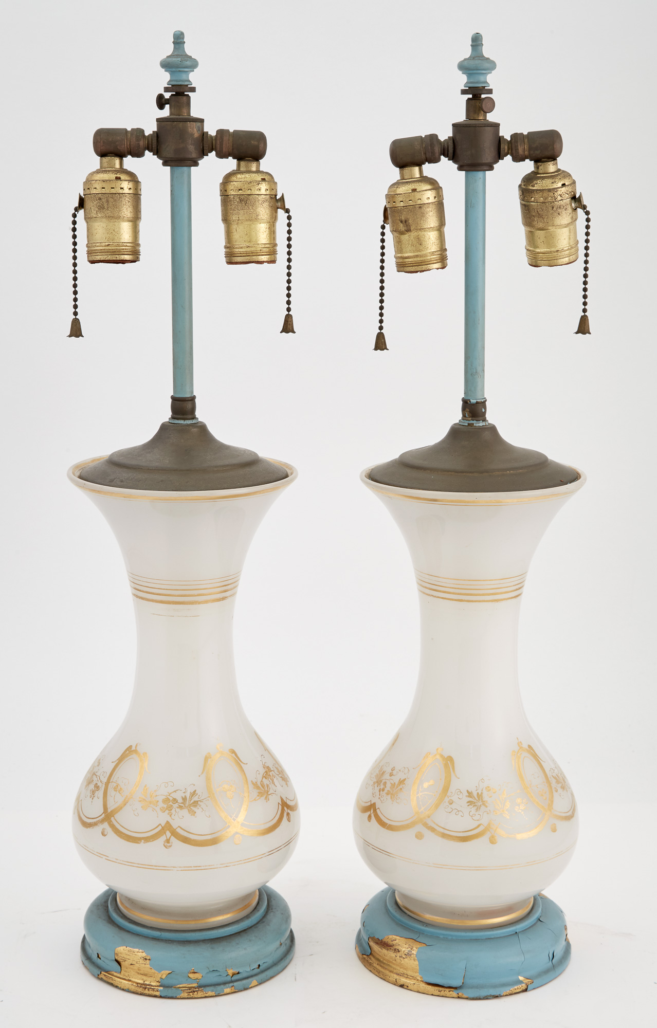 Lot image - Pair of French Gilt Decorated White Opaline Glass Lamps