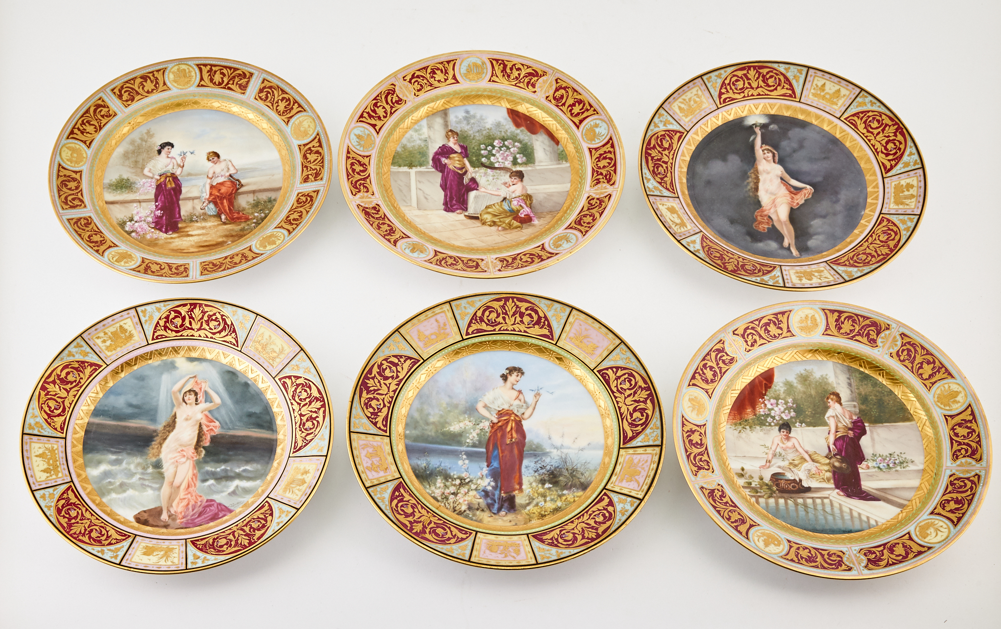 Lot image - Assembled Set of Six Vienna Style Gilt and Hand-Painted Porcelain Cabinet Plates
