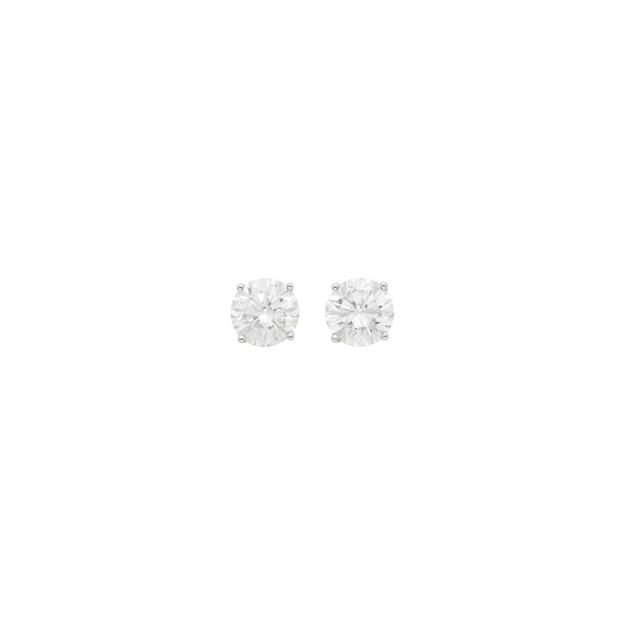 Lot image - Pair of White Gold and Diamond Stud Earrings