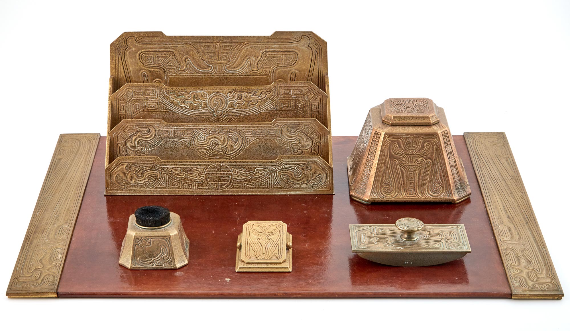 Lot image - Tiffany Studios Gilt-Bronze Chinese Pattern Partial Desk Set