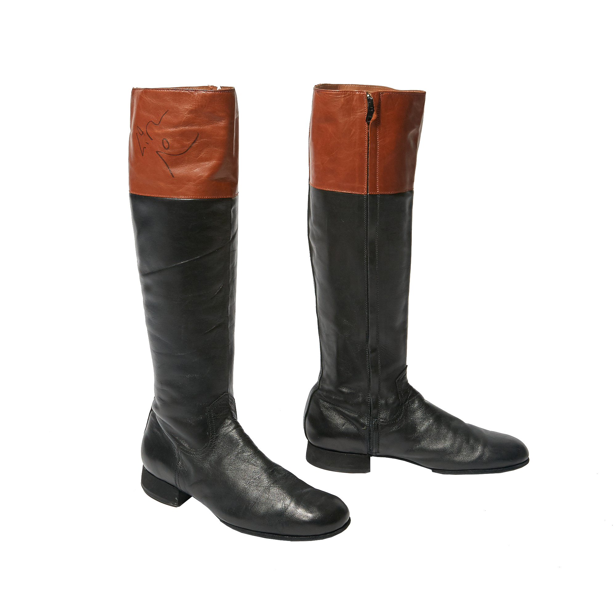 Lot image - HAMILTON  Lin-Manuel Mirandas autographed stage worn boots from Hamilton: An American Musical