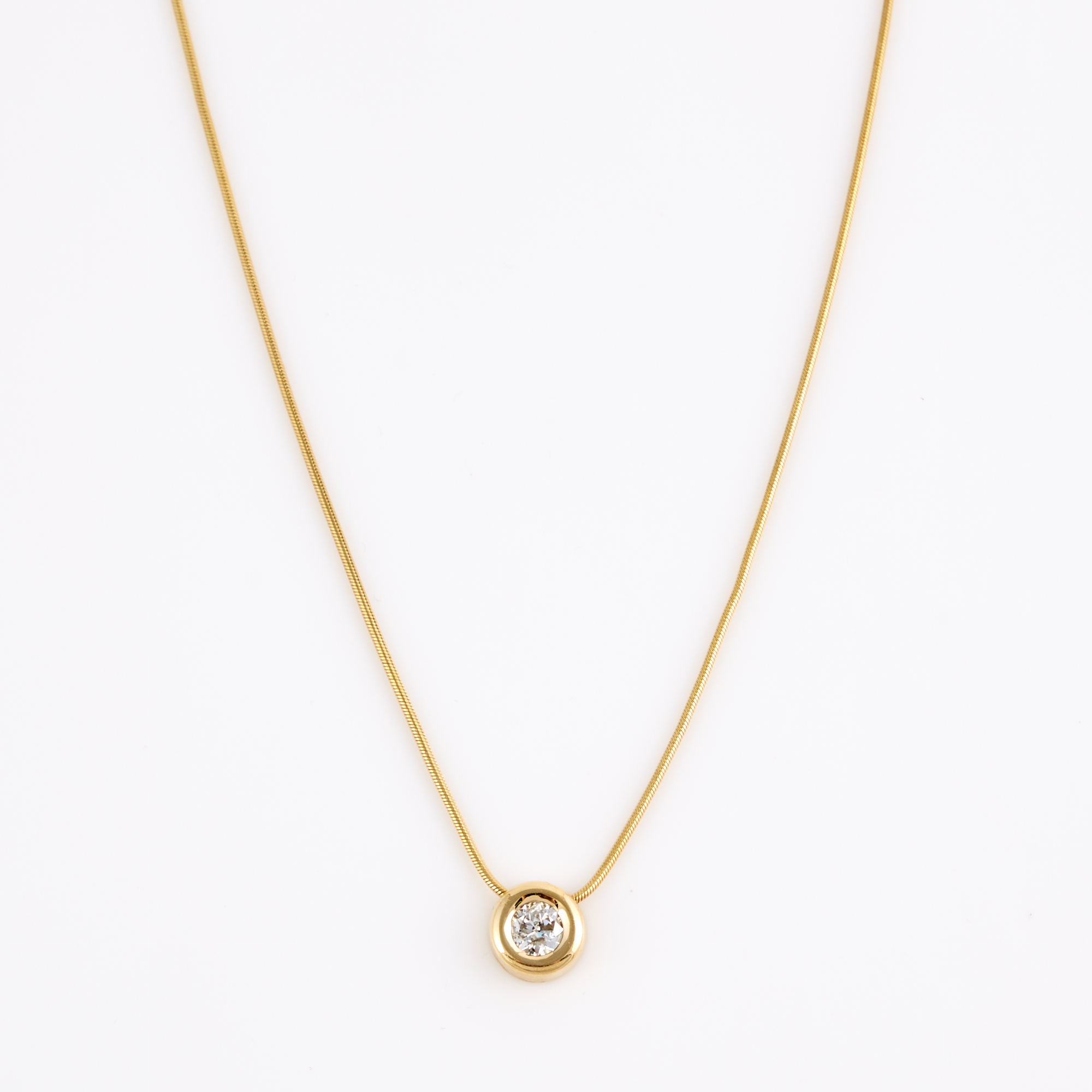 Lot image - Diamond Solitaire Pendant about 0.95 ct. and Gold Neck Chain, 14K 7 dwt., stone damaged