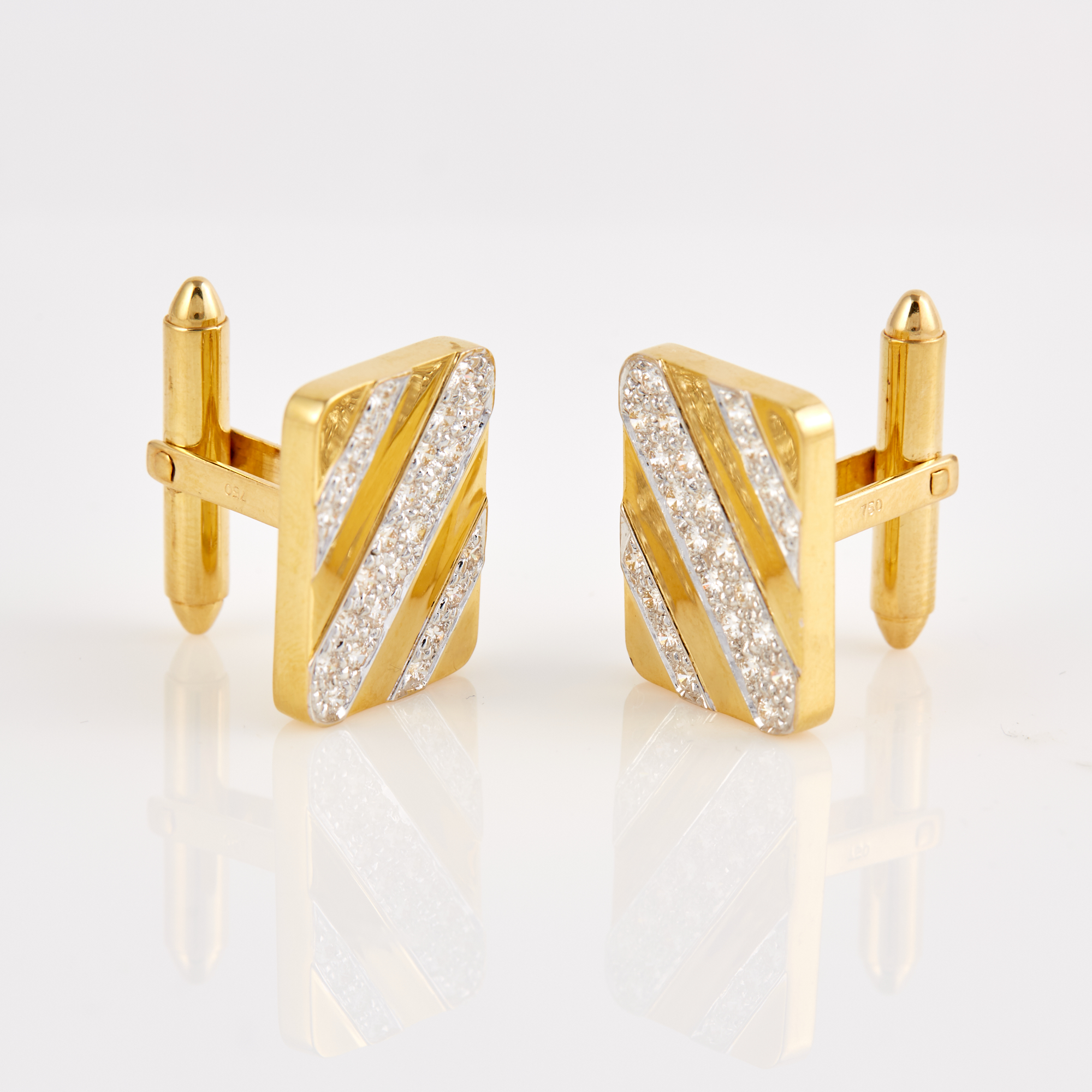 Lot image - Two Diamond Cuff Links, 48 diamonds about 1.20 cts., 18K 9 dwt.