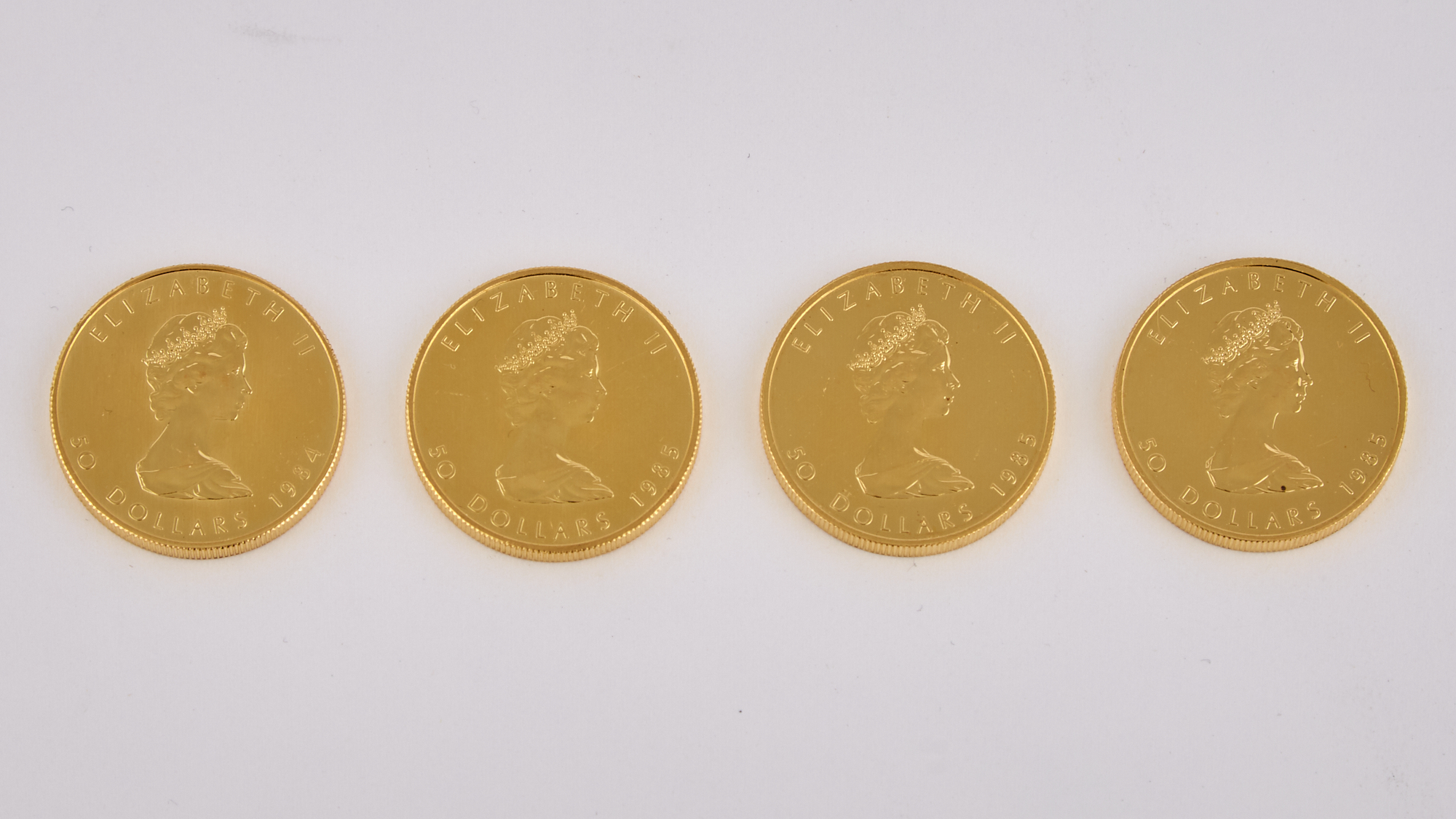 Lot image - Canada Four Gold Mapleleafs