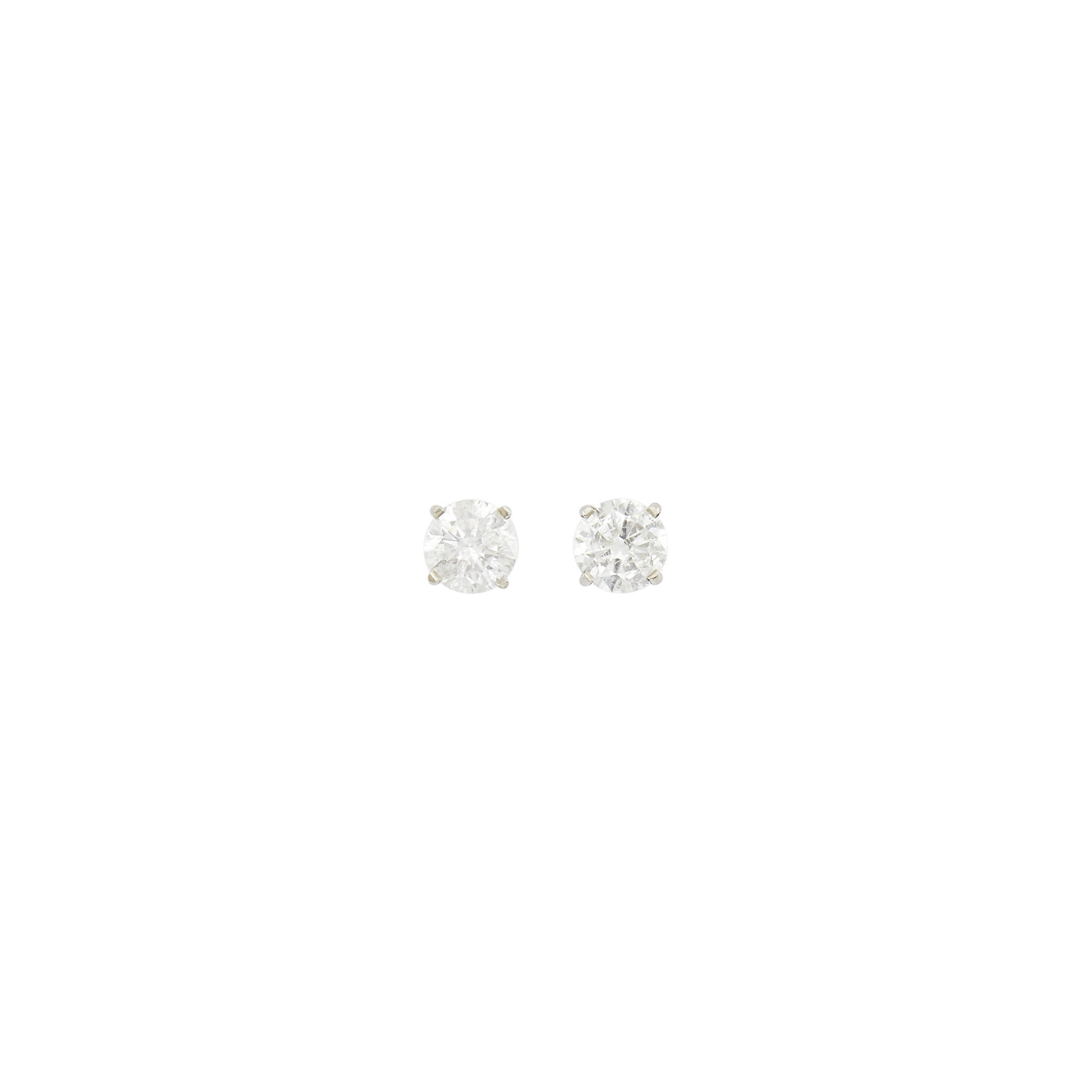 Lot image - Pair of White Gold and Treated Diamond Stud Earrings