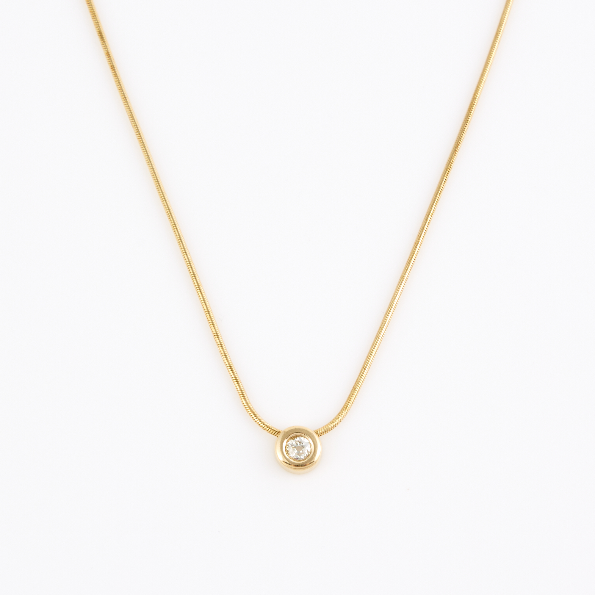 Lot image - Diamond Solitaire Pendant about 0.35 ct. and Gold Neck Chain, 14K 7 dwt., stone damaged