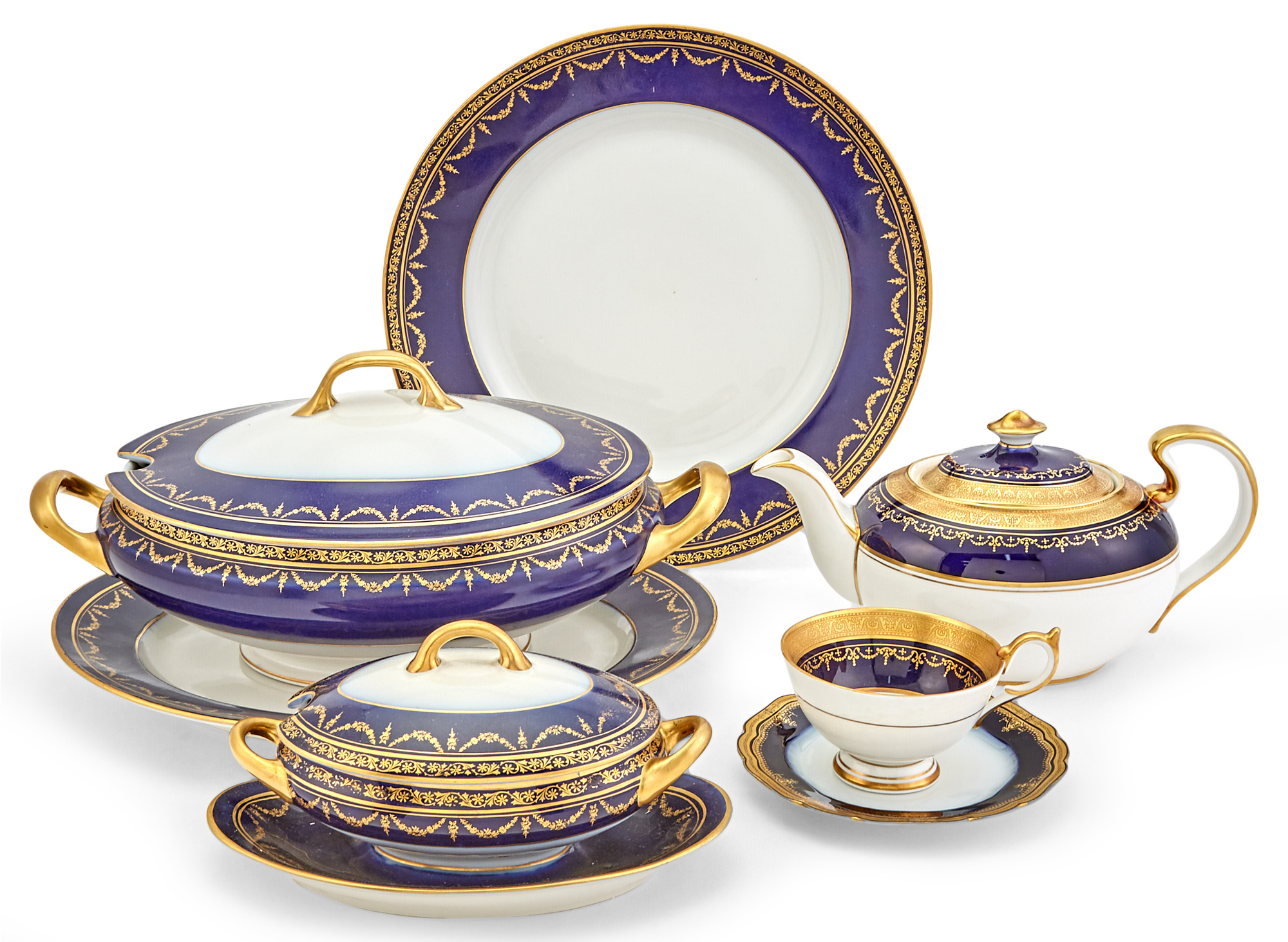 Lot image - Assembled Cobalt and Gilt-Decorated Porcelain Dinner Service