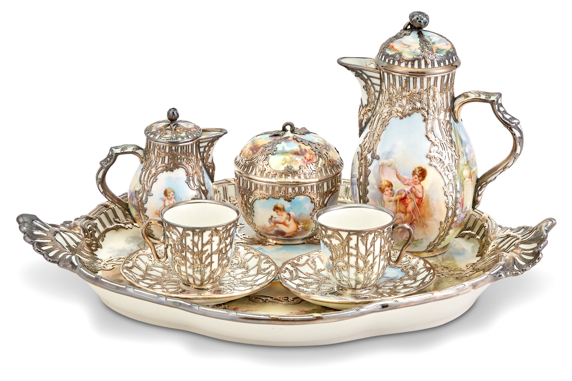 Lot image - KPM Rococo Style Hand-Painted Porcelain Tête-à-Tête Service with Silver Overlay Decoration
