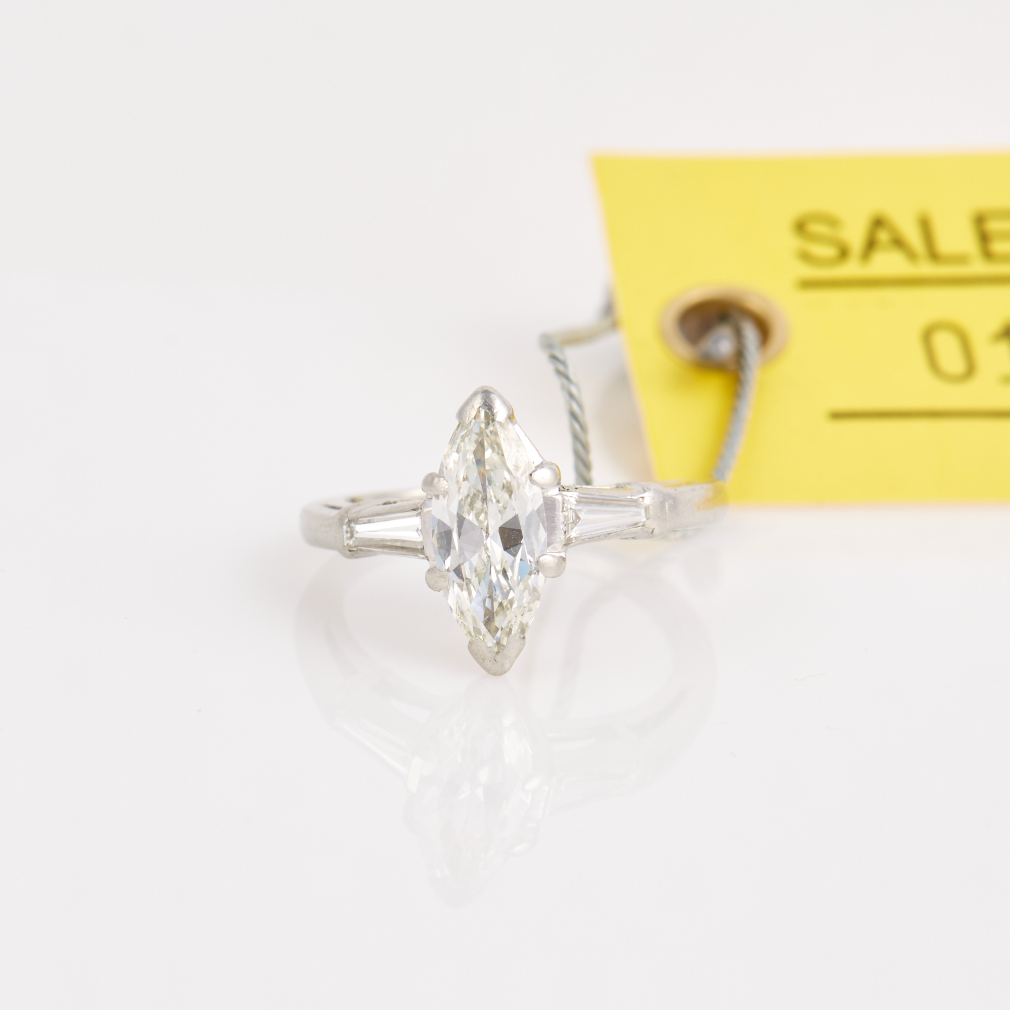 Lot image - Diamond Engagement Ring, 3 diamonds, center stone about 1.00 ct., 2 stones about 0.30 ct., Platinum 3 dwt.