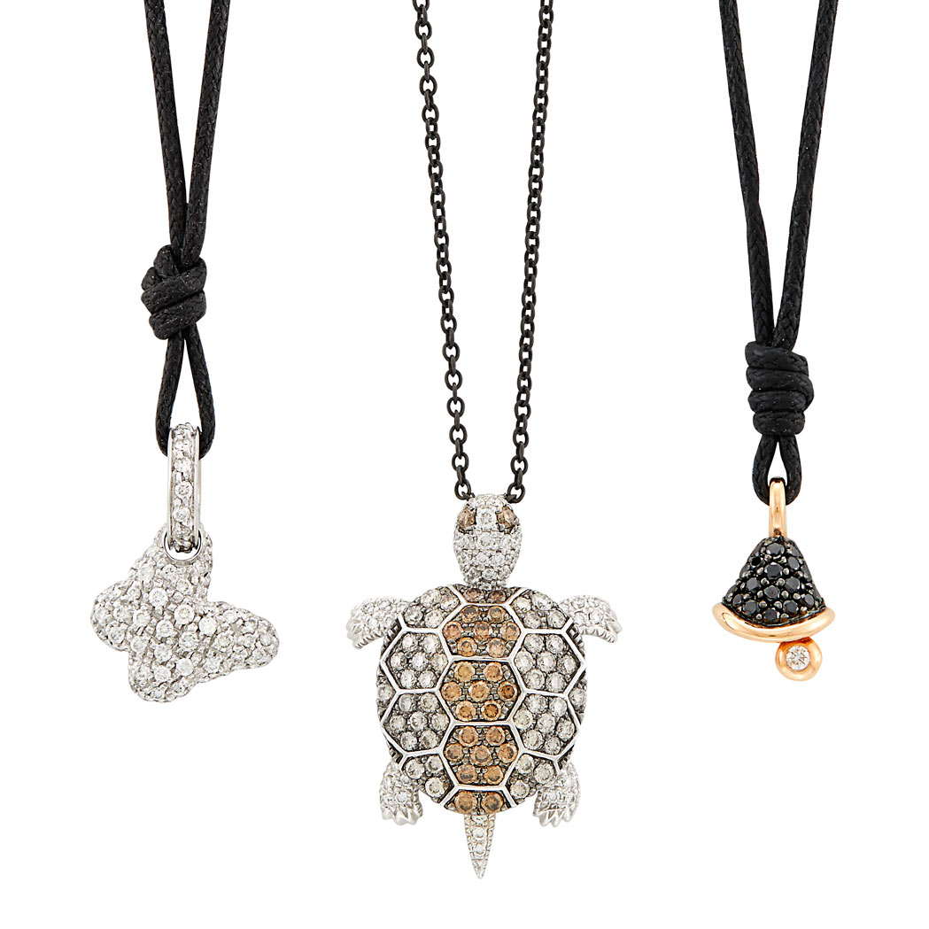 Lot image - Three Tricolor Gold, Diamond, Colored Diamond Turtle, Butterfly and Bell Charms with Blackened Gold and Cord Necklaces