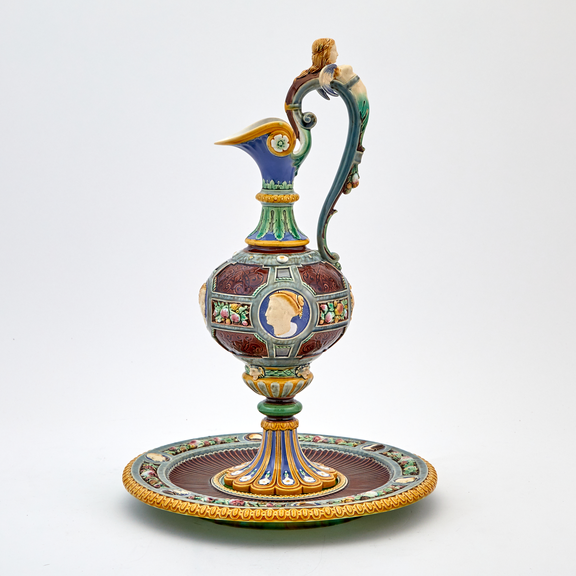 Lot image - Minton Majolica Renaissance Style Brown and Green Ground Crystal Palace Art Union Ewer and Stand