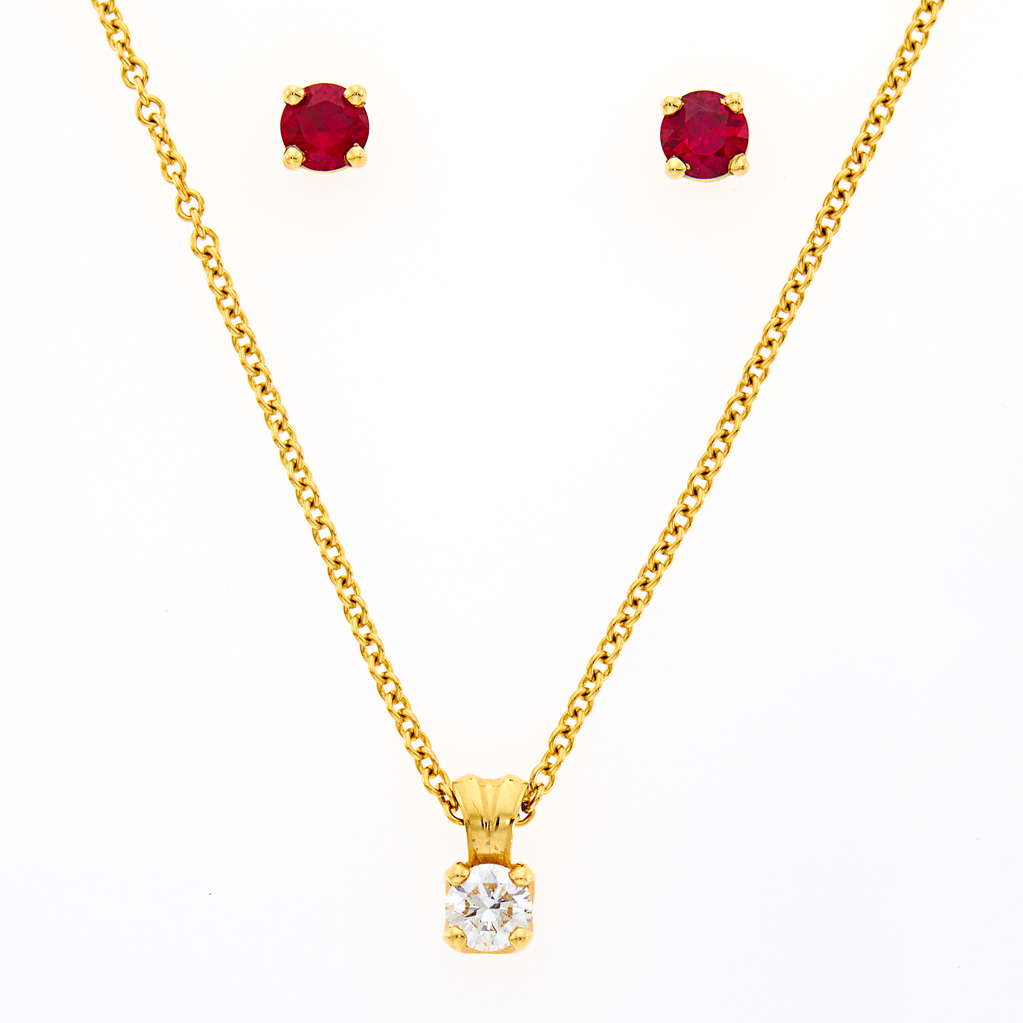 Lot image - Gold and Diamond Pendant with Chain Necklace and Pair of Ruby Earrings