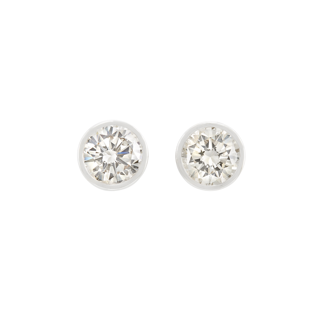 Lot image - Pair of White Gold and Diamond Stud Earrings
