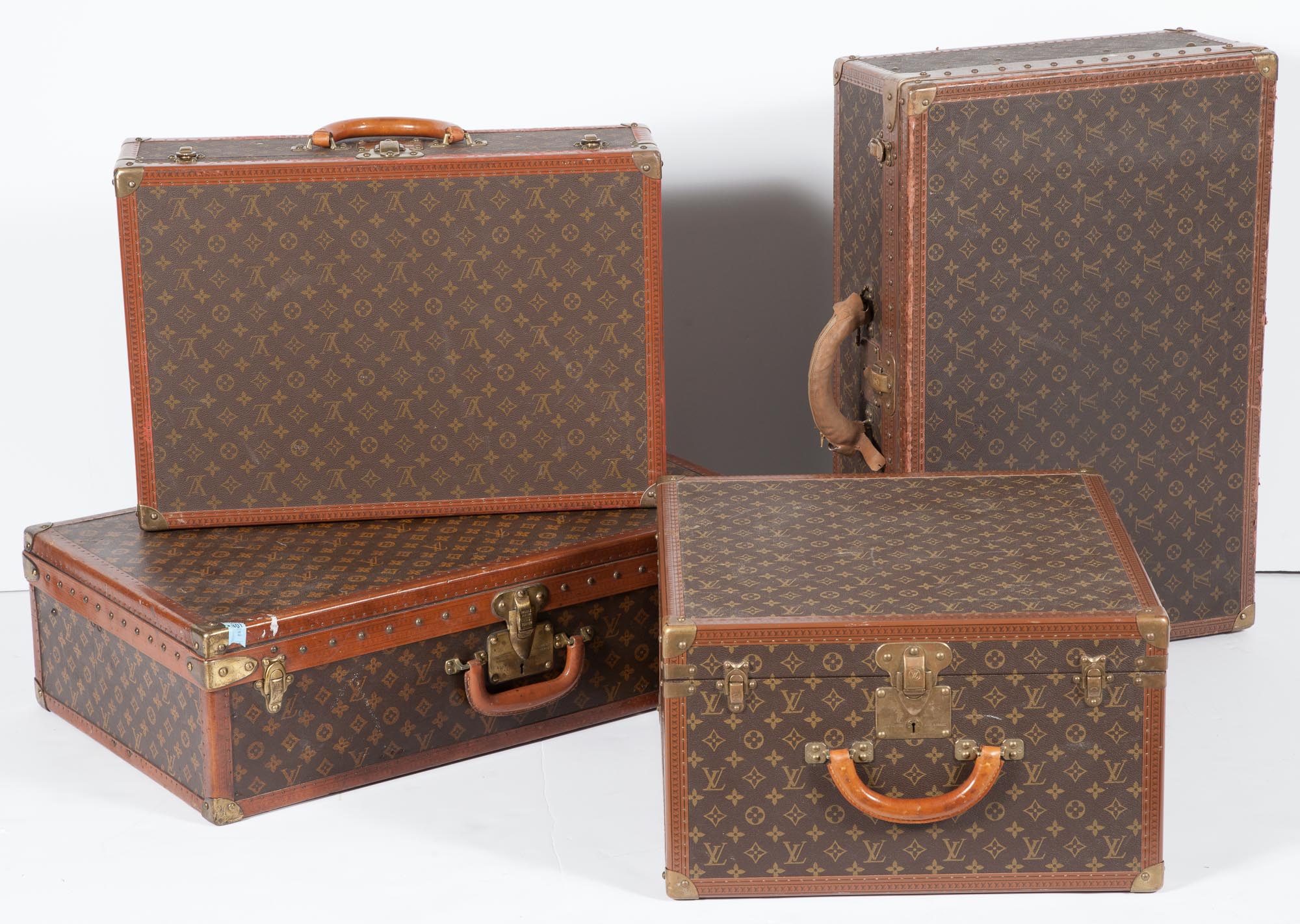 Lot image - Group of Four Louis Vuitton Hard Side Suitcases