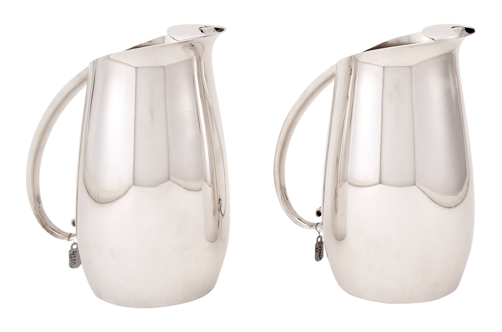 Lot image - Associated Pair of Tiffany & Co. Sterling Silver Water Pitchers