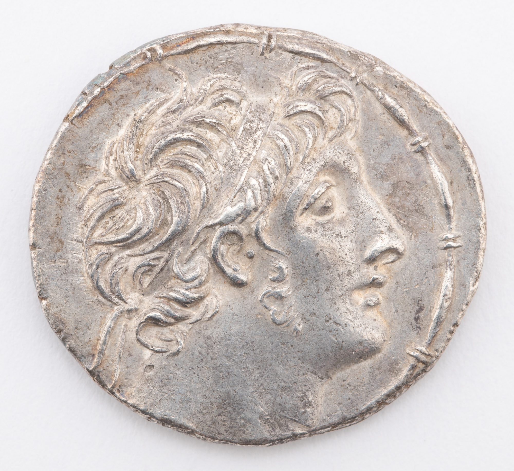 Lot image - Seleucid Empire, Antiochos IX, 114-95 BC. AR Tetradrachm (15.9g), Ake-Ptolemais mint, 113-107 BC.