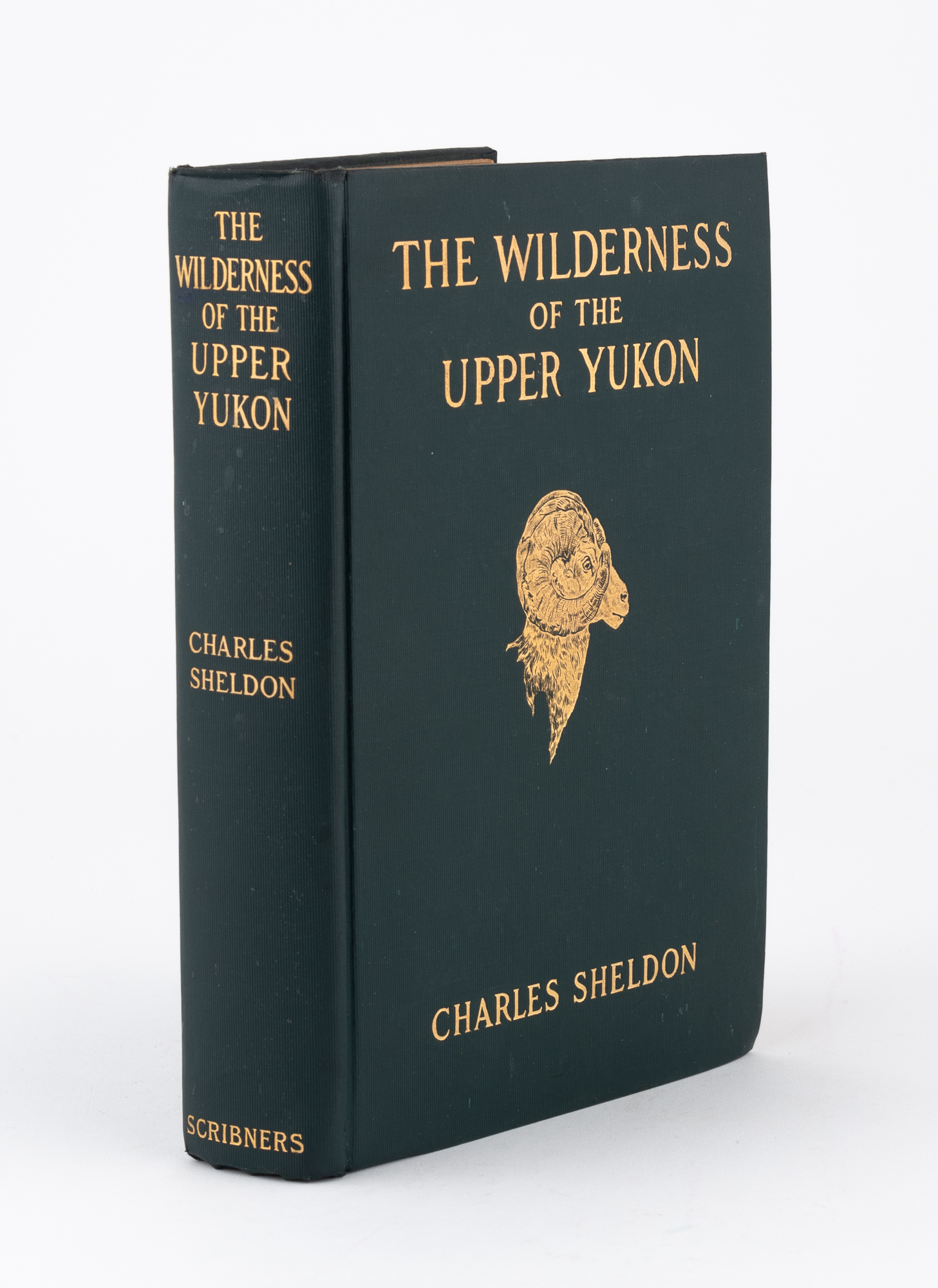 Lot image - SHELDON, CHARLES  A group of three first editions by the author about hunting in British Columbia, the Yukon and Alaska.