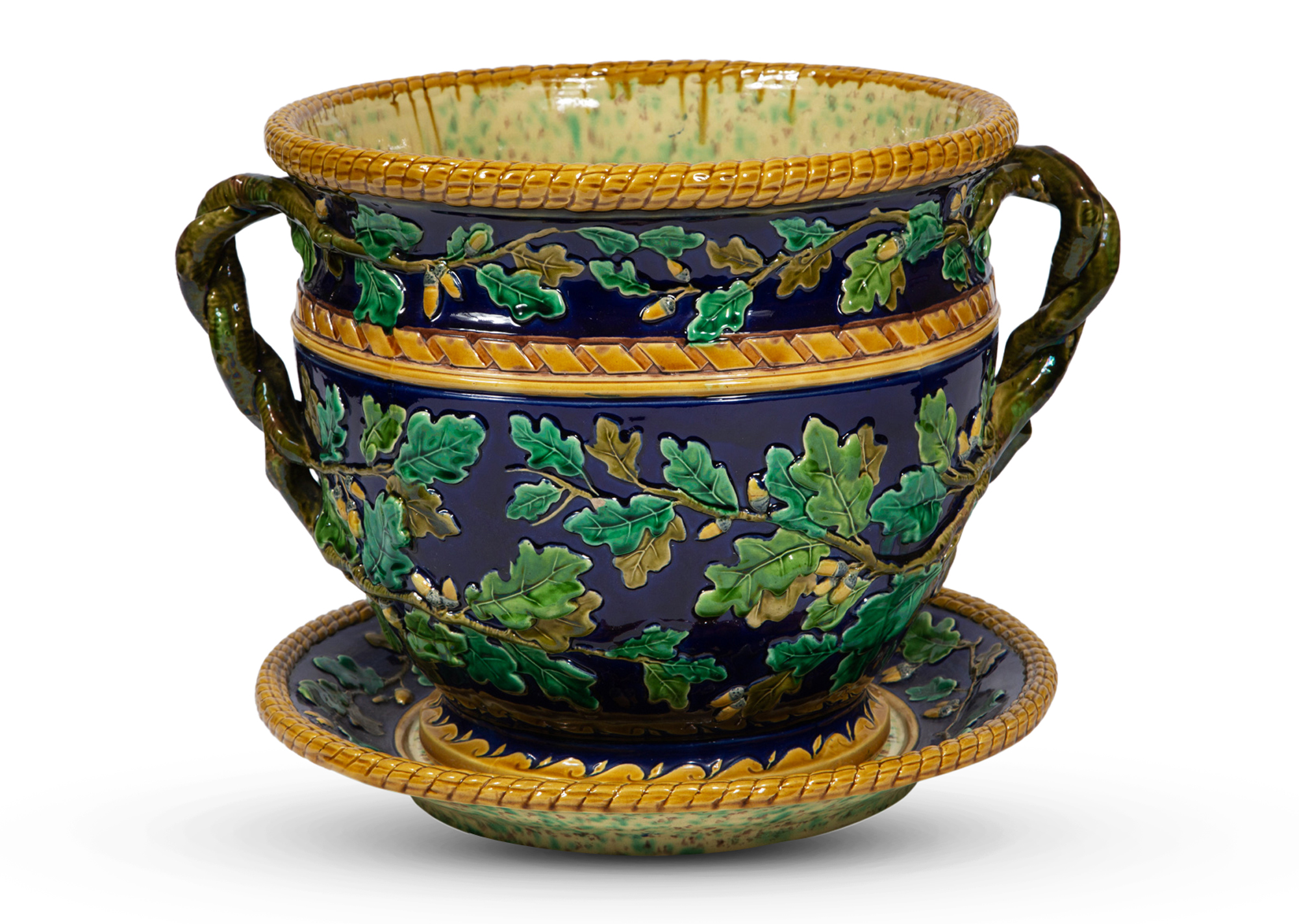 Lot image - Mintons Majolica Cobalt-Blue Ground Two-Handled Acorn and Oak Leaf Garden Pot and Stand