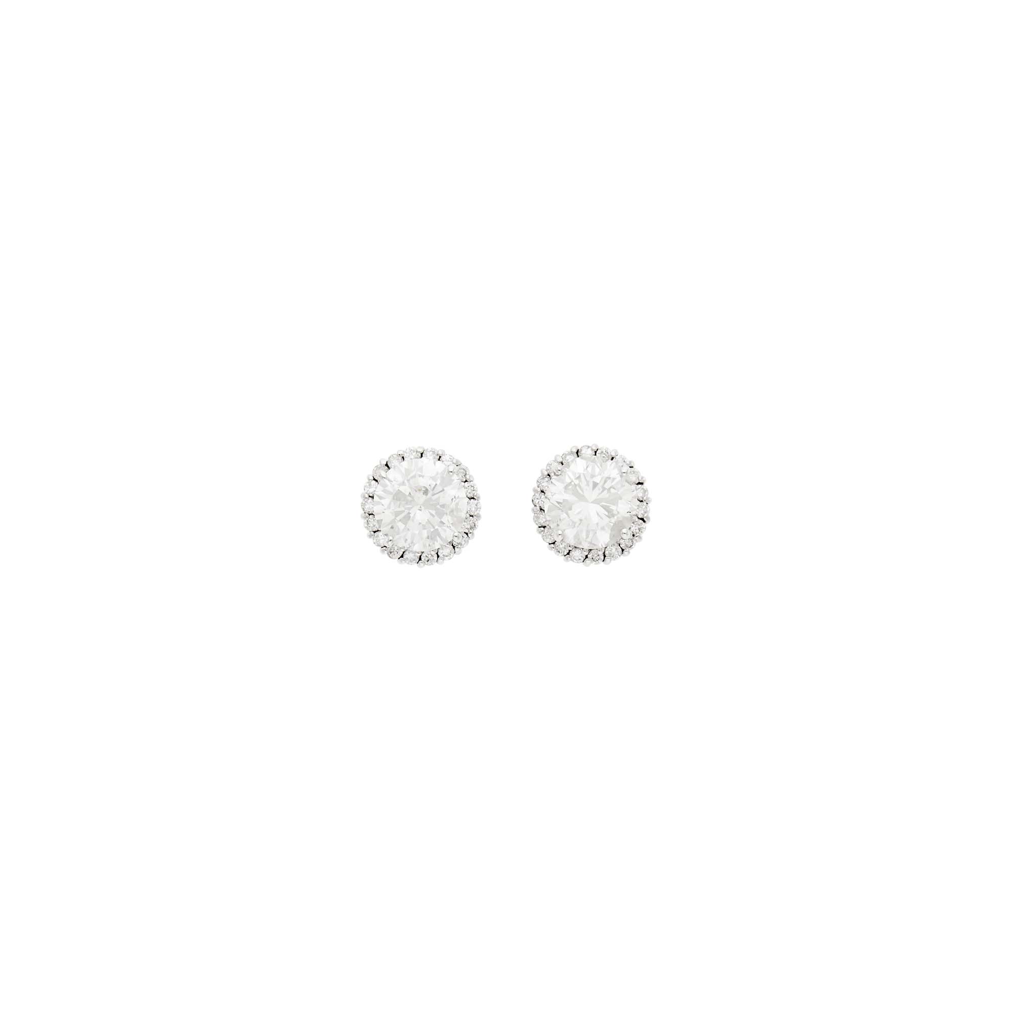 Lot image - Pair of White Gold and Diamond Stud Earrings