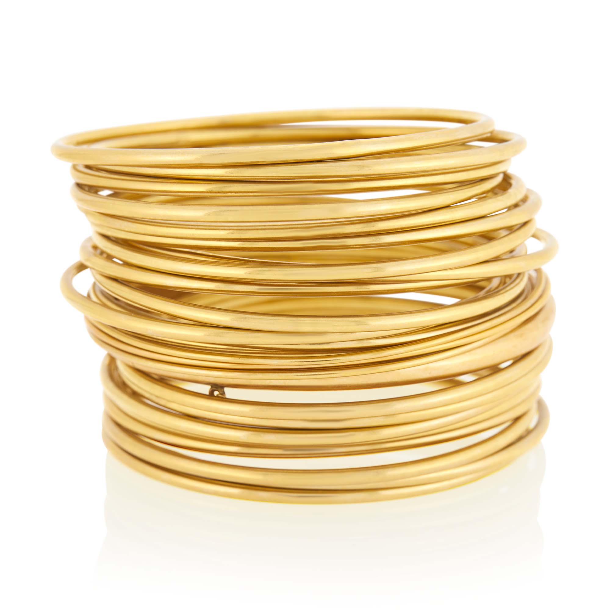 Lot image - Twenty-Five Gold Bangle Bracelets