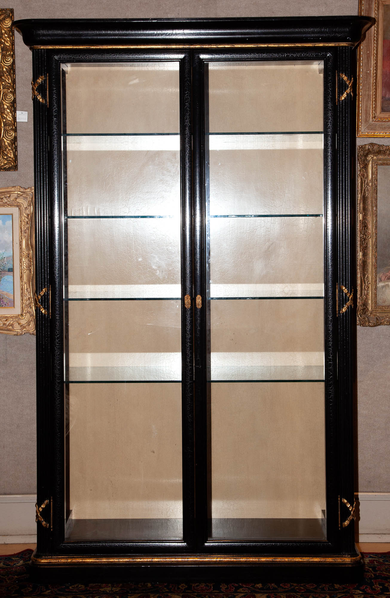 Lot image - Louis XVI Style Black-Painted and Parcel-Gilt Vitrine Cabinet