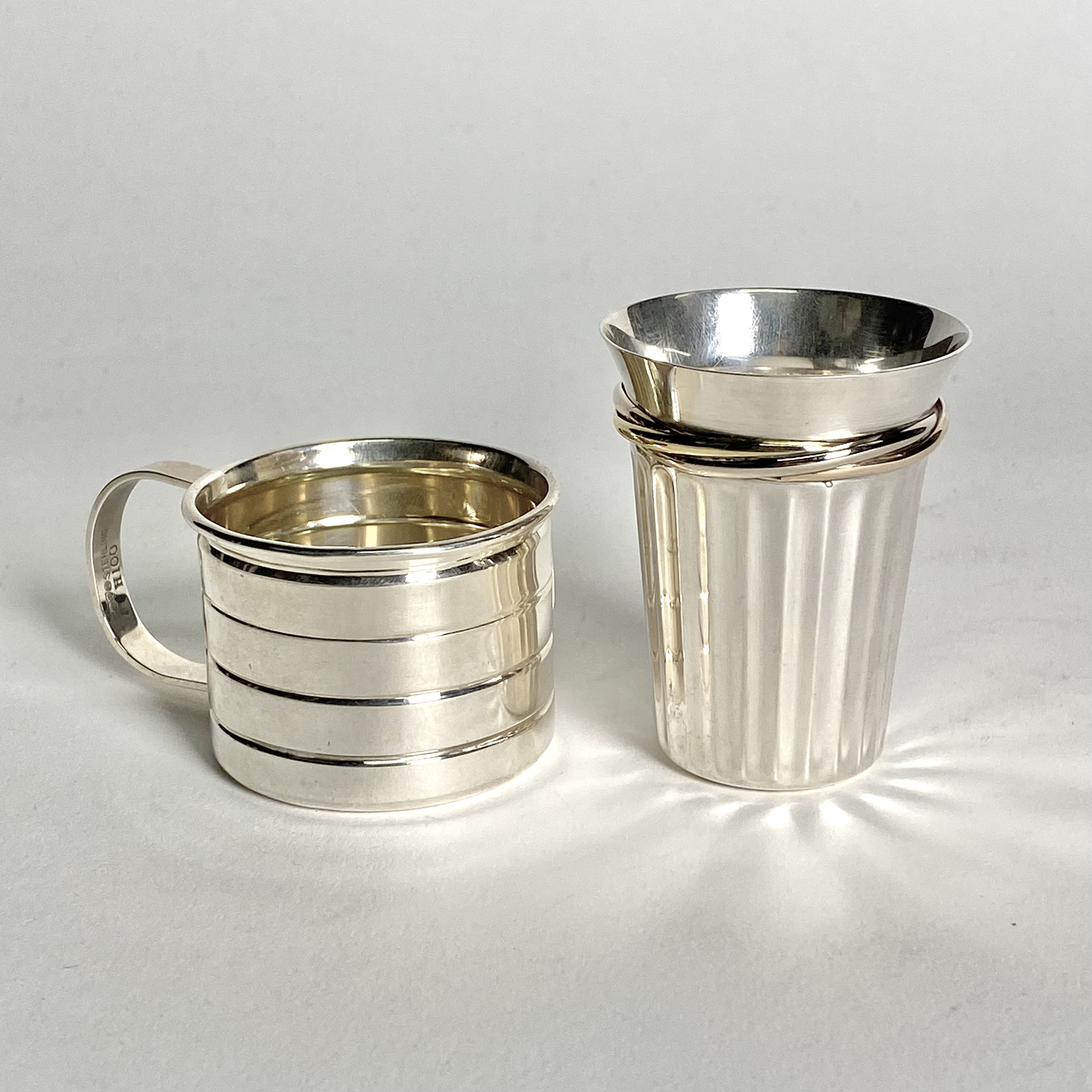 Lot image - Two Cartier Sterling Silver Spirit Measures