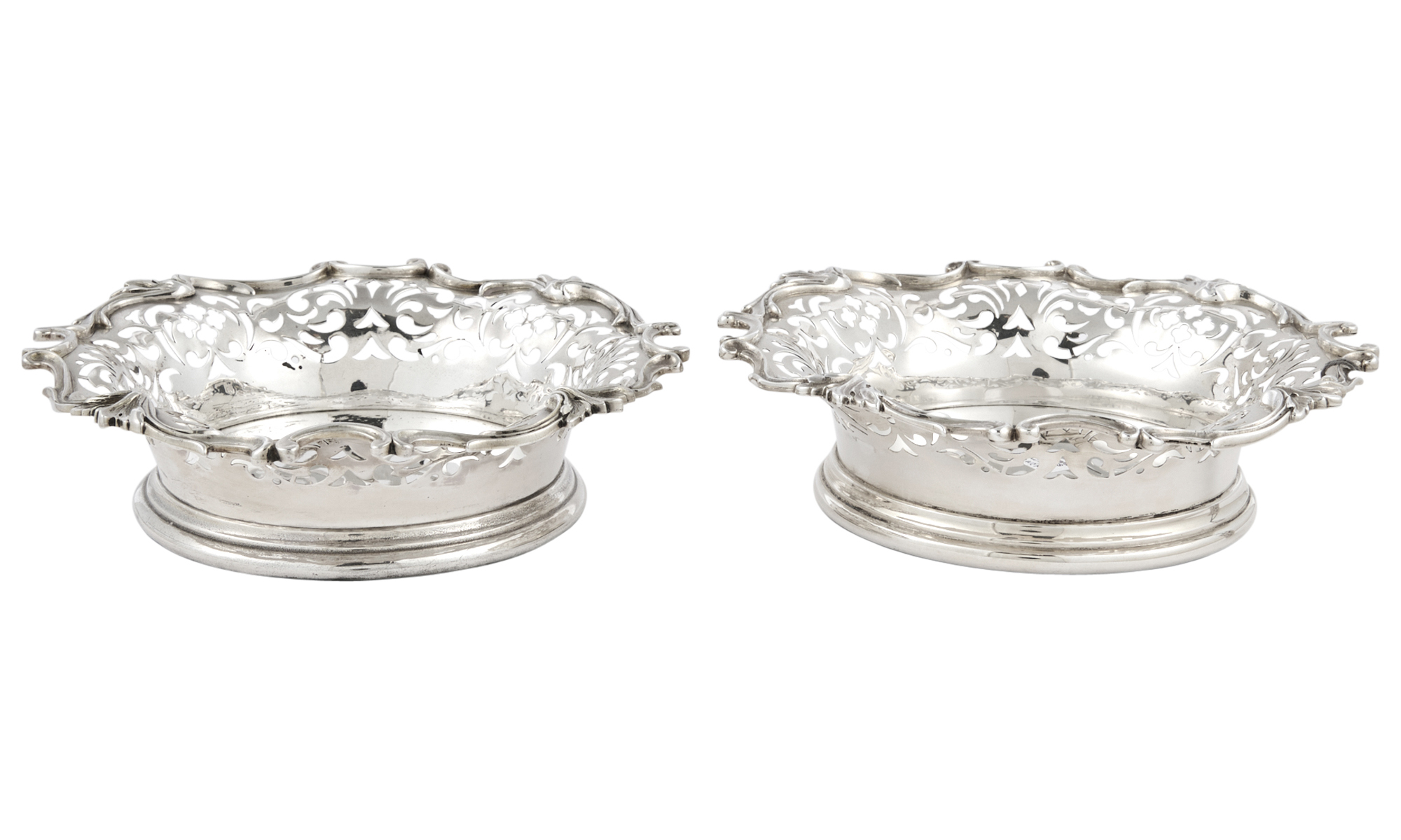 Lot image - Pair of Howard & Co. Sterling Silver Bottle Coasters